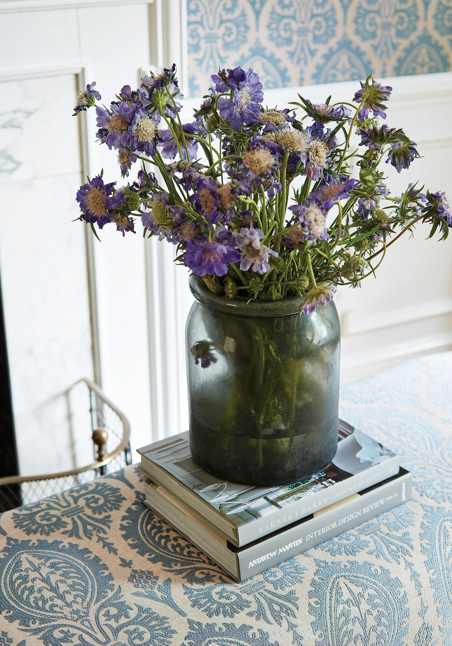 Detailed view of Baxter Bench in Sir Thomas Embroidery woven fabric in slate blue color variant by Thibaut in the Chestnut Hill collection - pattern number W772571