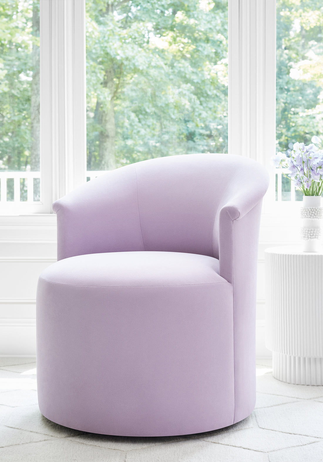 Ashby chair with Swivel in Club Velvet sustainable woven fabric in lilac color - pattern number W7214 by Thibaut in the Club Velvet collection
