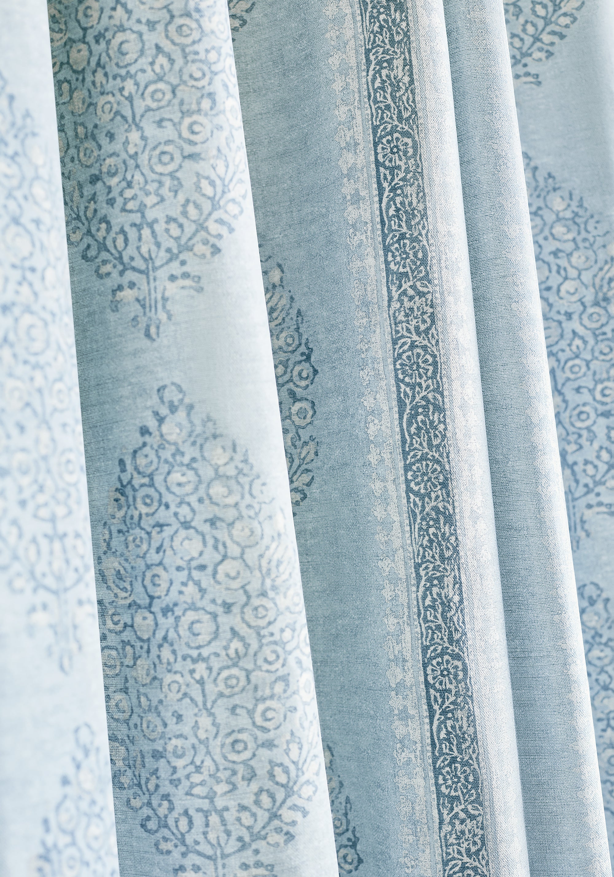 Detailed Chappana printed fabric in slate blue color, pattern number F910235 of the Thibaut Colony collection