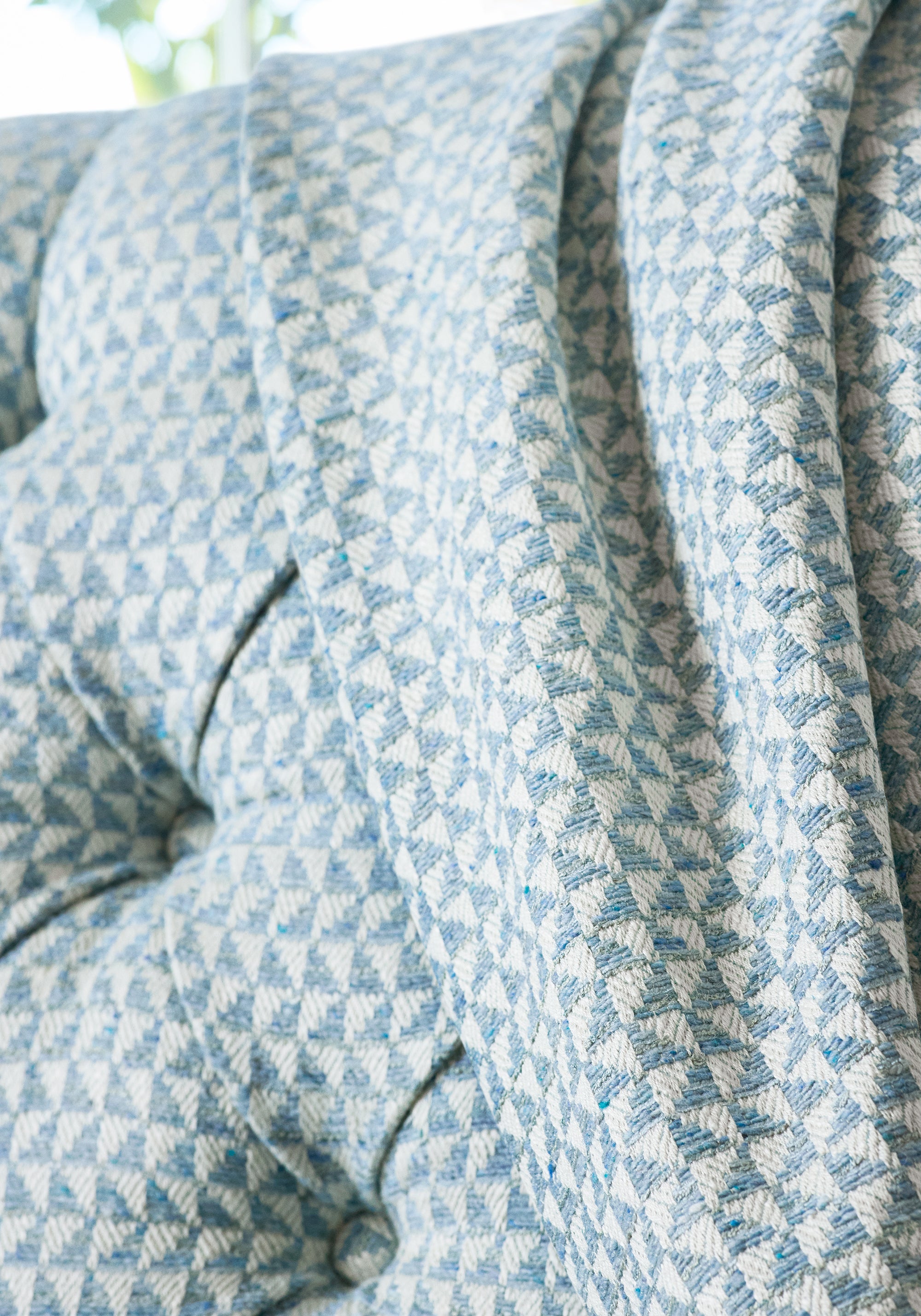 Detailed Pollux woven fabric in sky color, pattern number W81910 of the Anna French Bristol collection