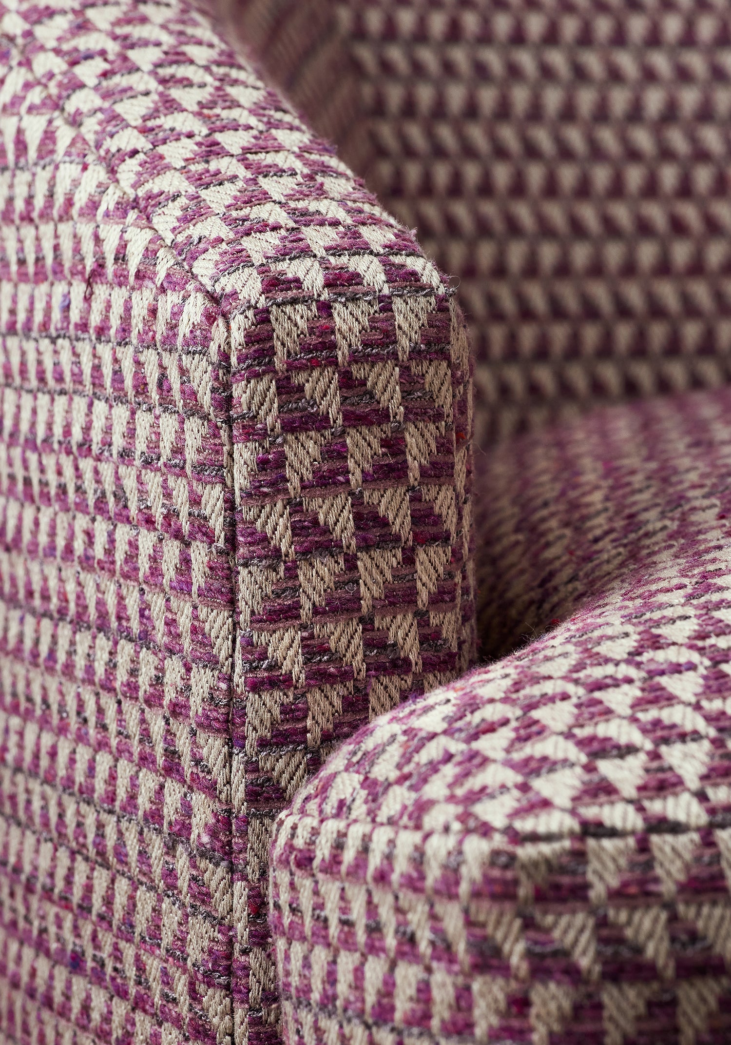 Detailed view of Dexter Chair in Pollux woven fabric in mulberry color variant by Anna French in the Bristol collection - pattern number W81908
