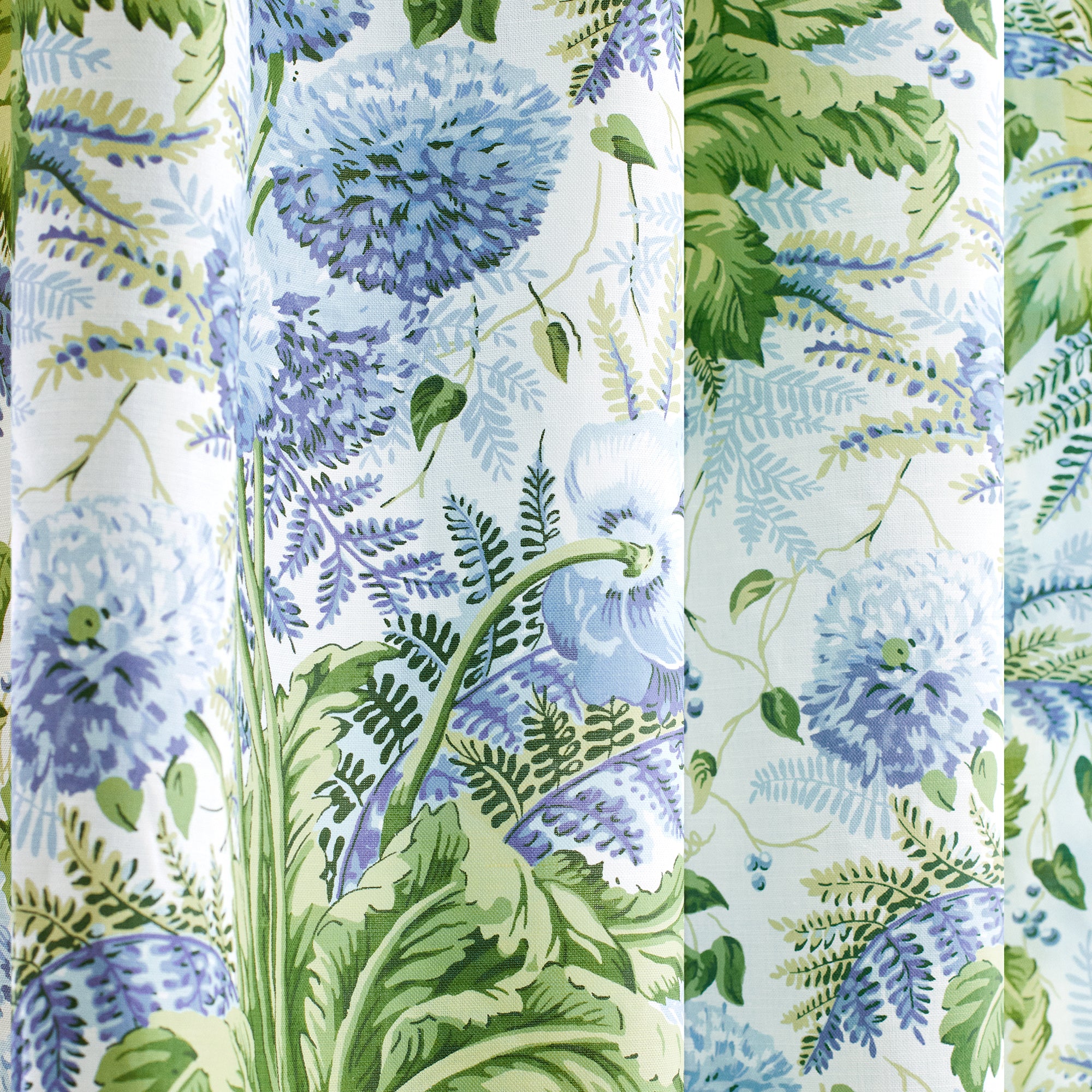 Detail on Dahlia printed fabric in Sky on White, Anna French pattern number AF24535