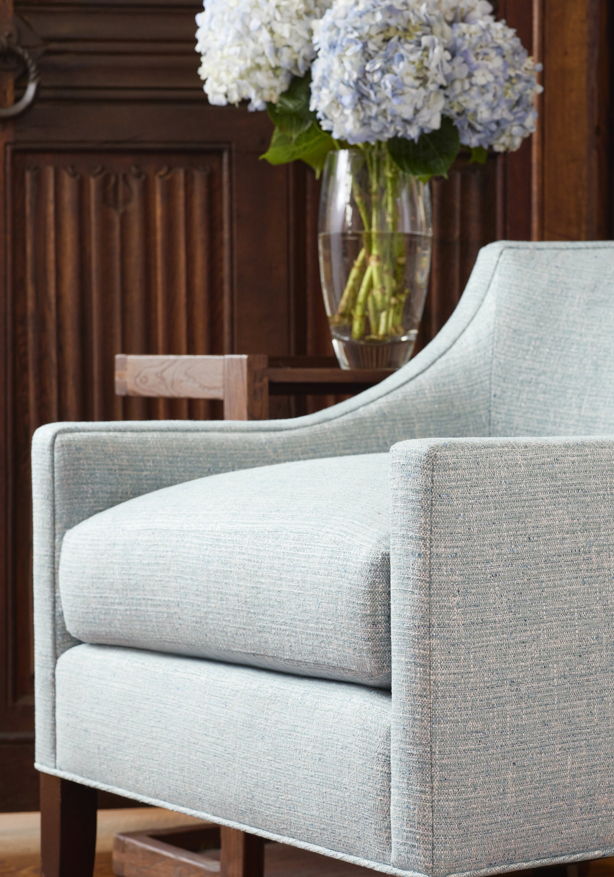 Chair upholstered in Elgin fabric in seaglass color - pattern number W80939 - by Thibaut fabrics