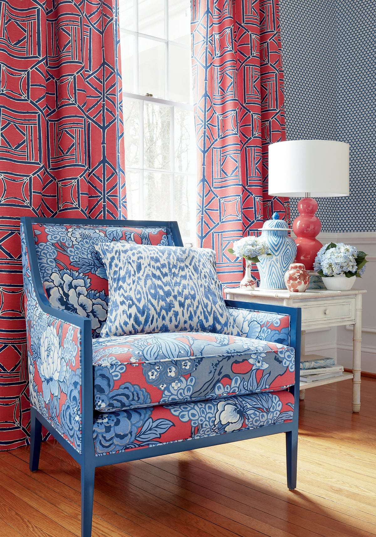 Drapery in Shoji Panel fabric in red and blue color - pattern number F975518 by Thibaut in the Dynasty collection