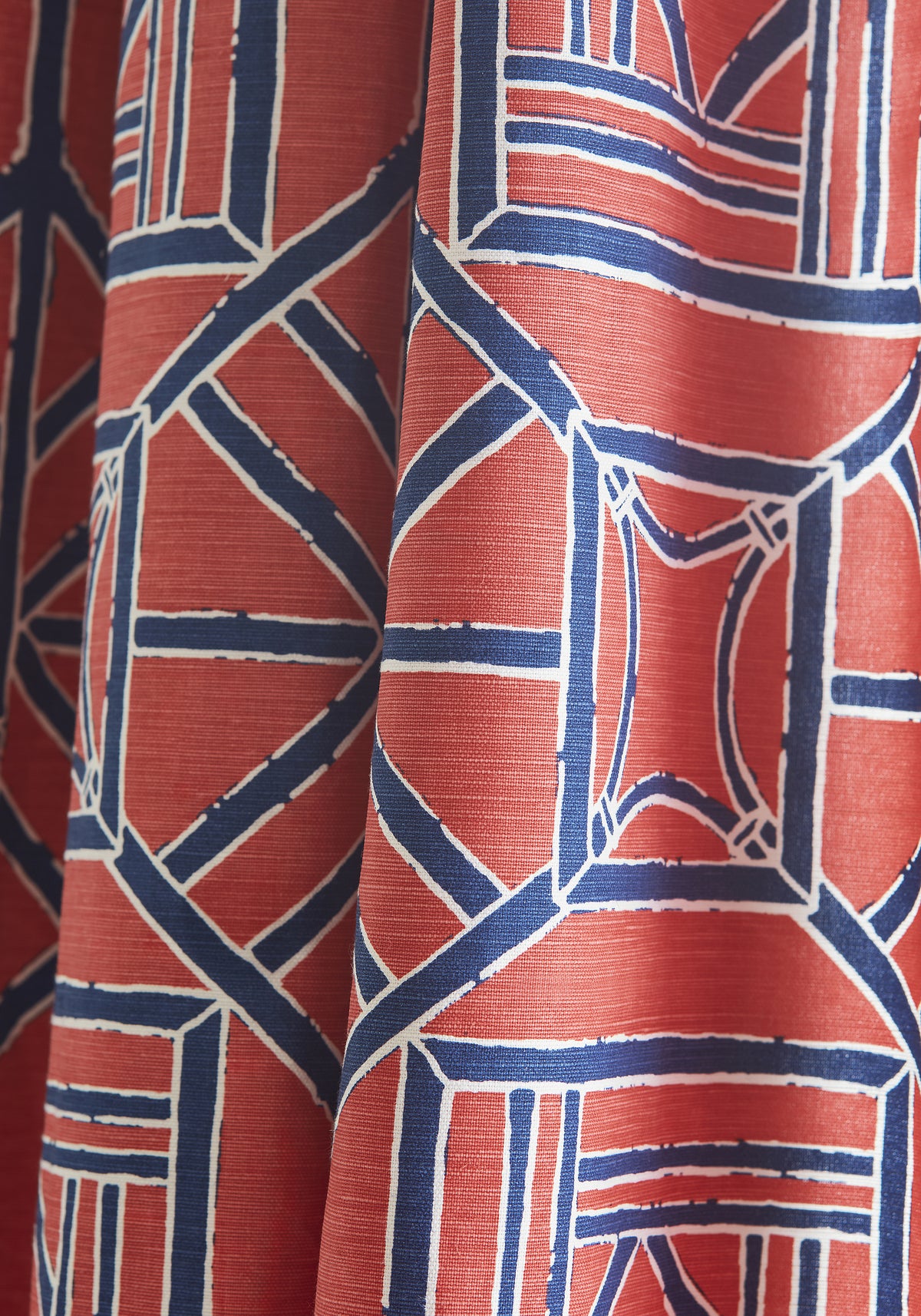Detailed view of drapery in Shoji Panel fabric in red and blue color variant by Thibaut in the Dynasty collection - pattern number F975518