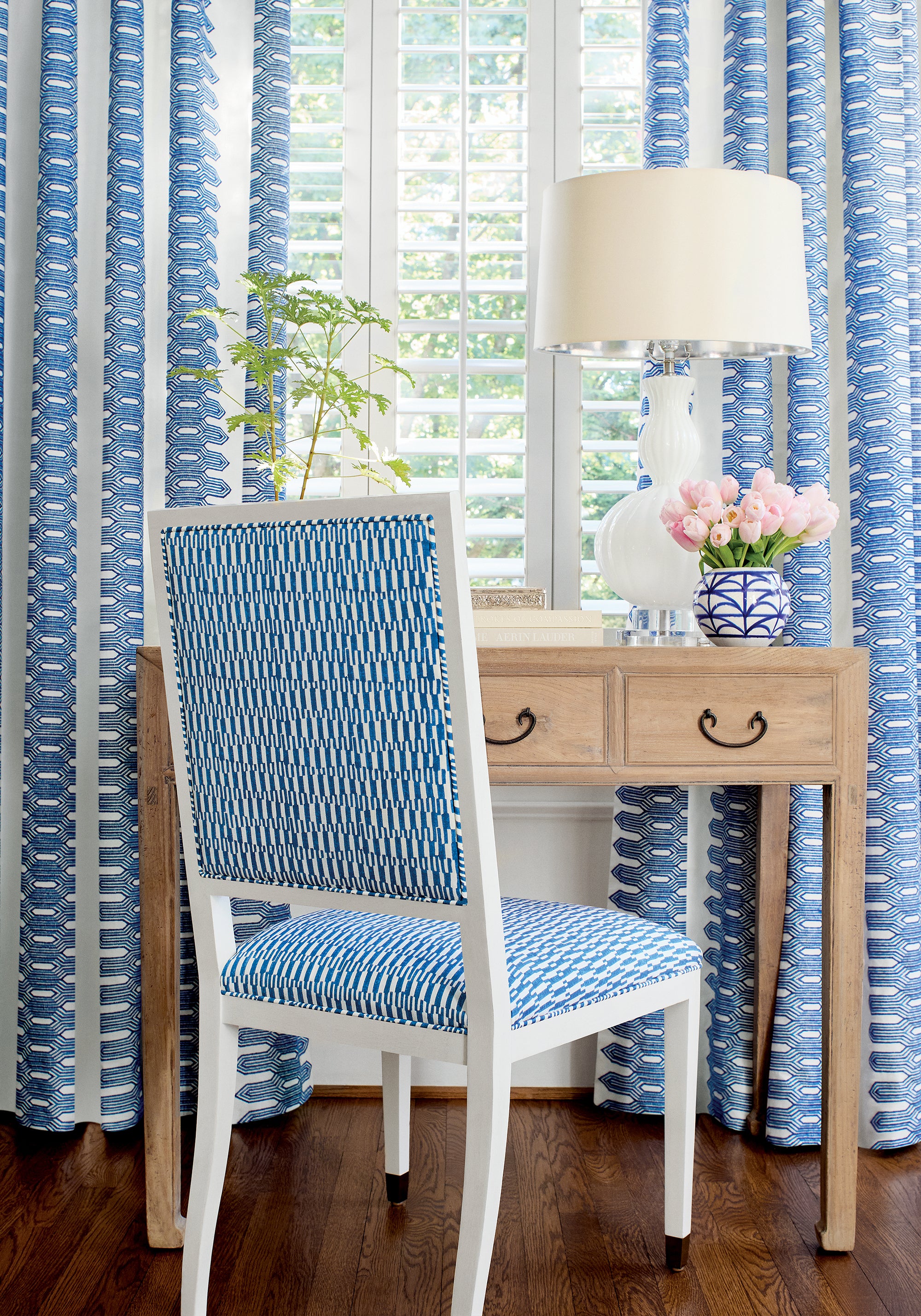 Lauderdale Dining Chair in GoGo printed fabric in navy color - pattern number F920805 by Thibaut in the Eden collection