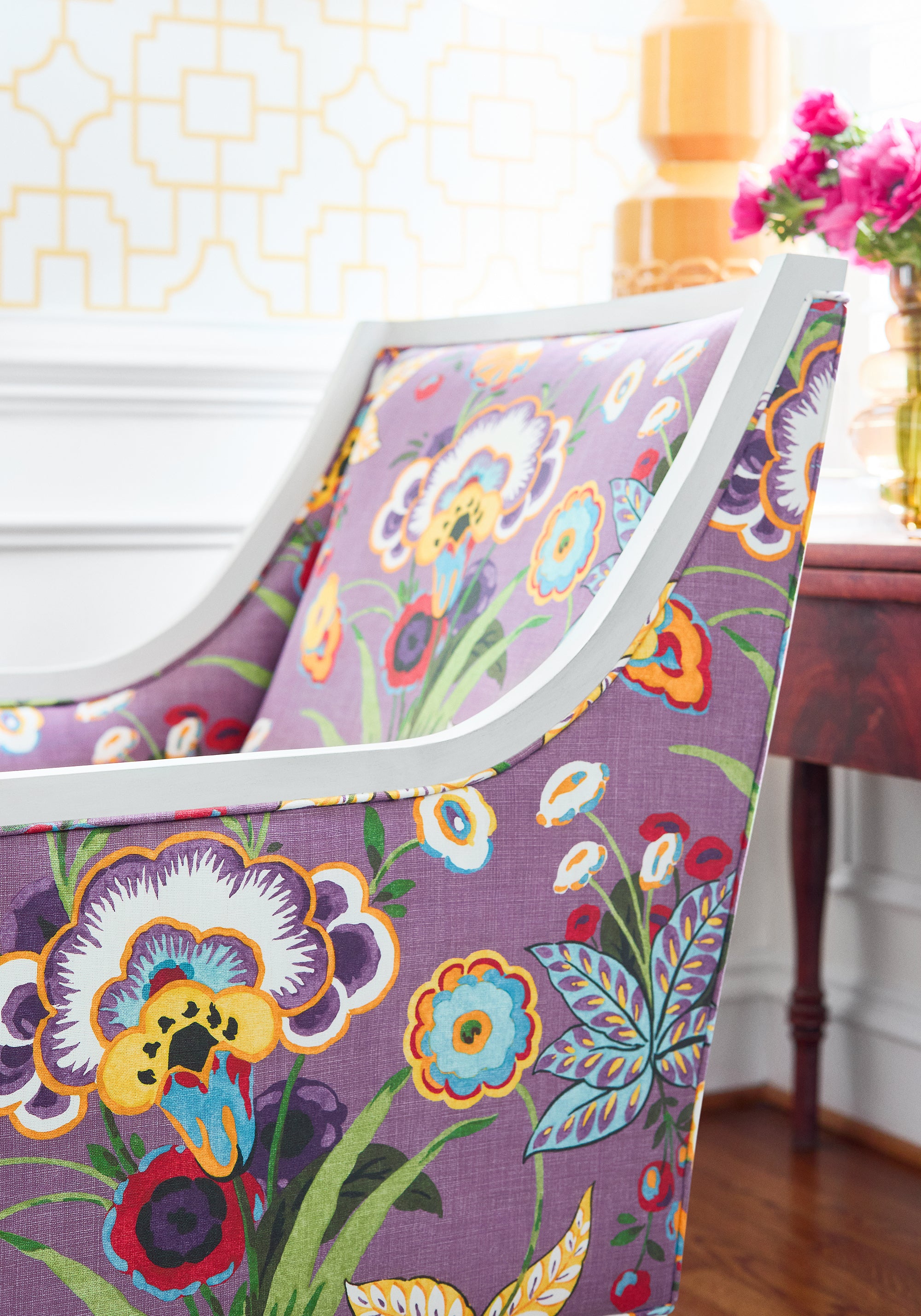 Detailed view of Pasadena Chair in Pasadena printed fabric in plum color variant by Thibaut in the Eden collection - pattern number F920850