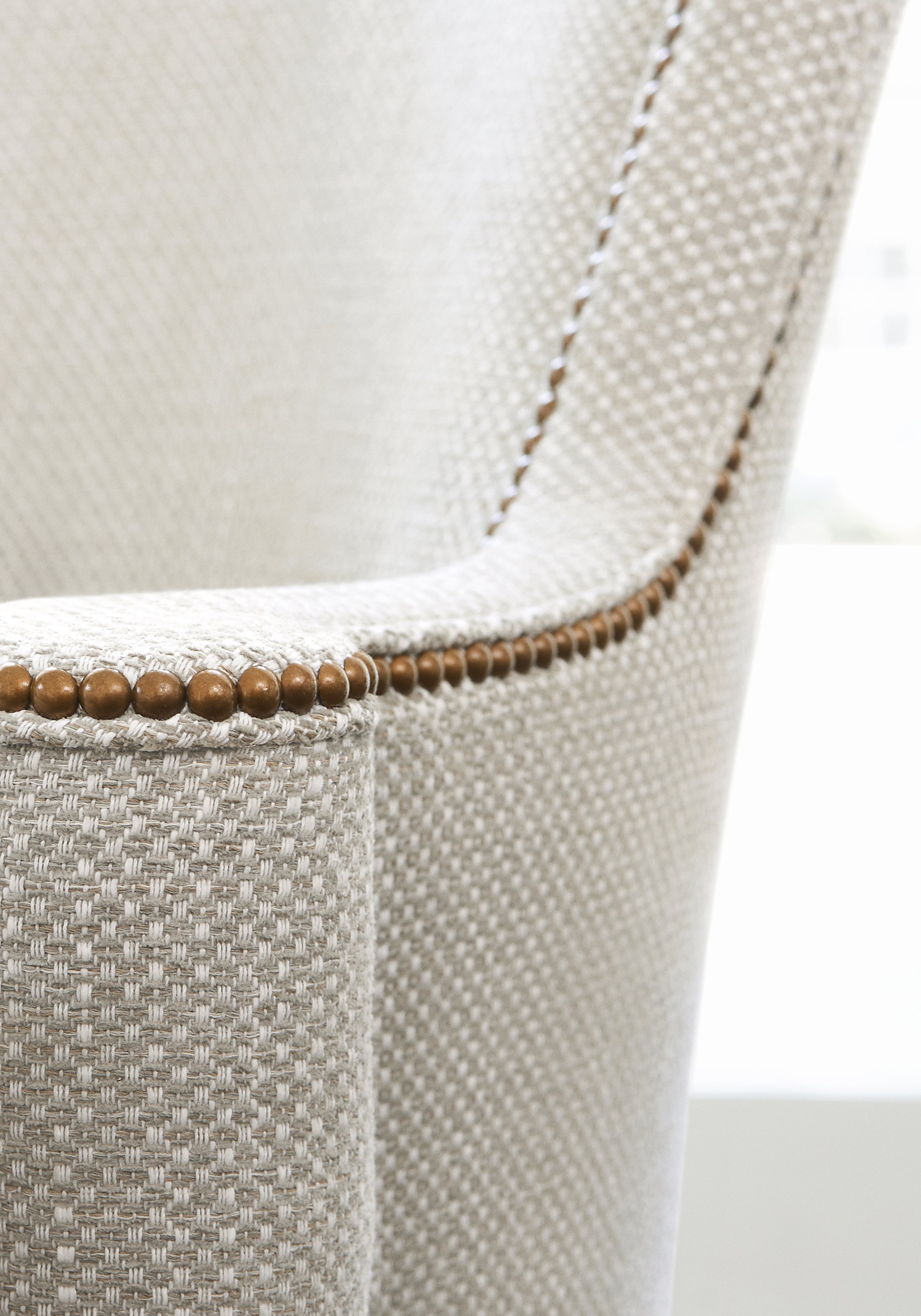 Closeup detail of Montclair Chair in Thibaut Cascade woven fabric in Dove color pattern number W75255