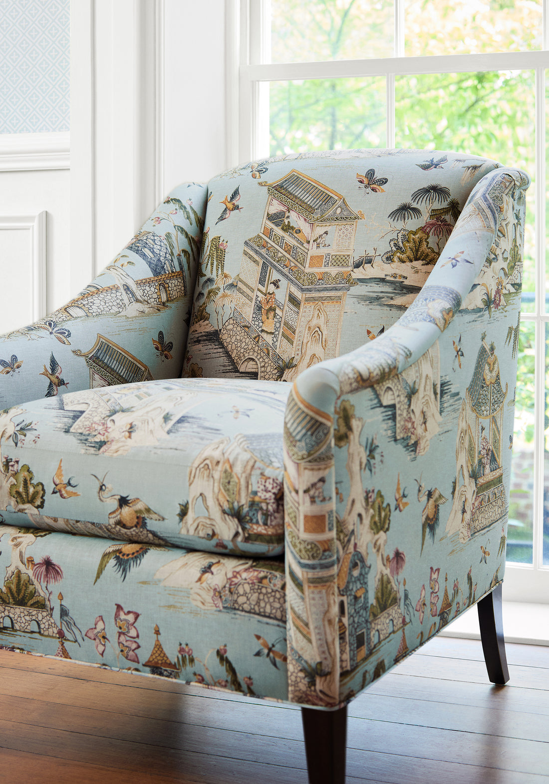 Detailed view of Stanwick Chair in Grand Palace printed fabric in mist color of the Grand Palace collection by Thibaut - pattern number F913617
