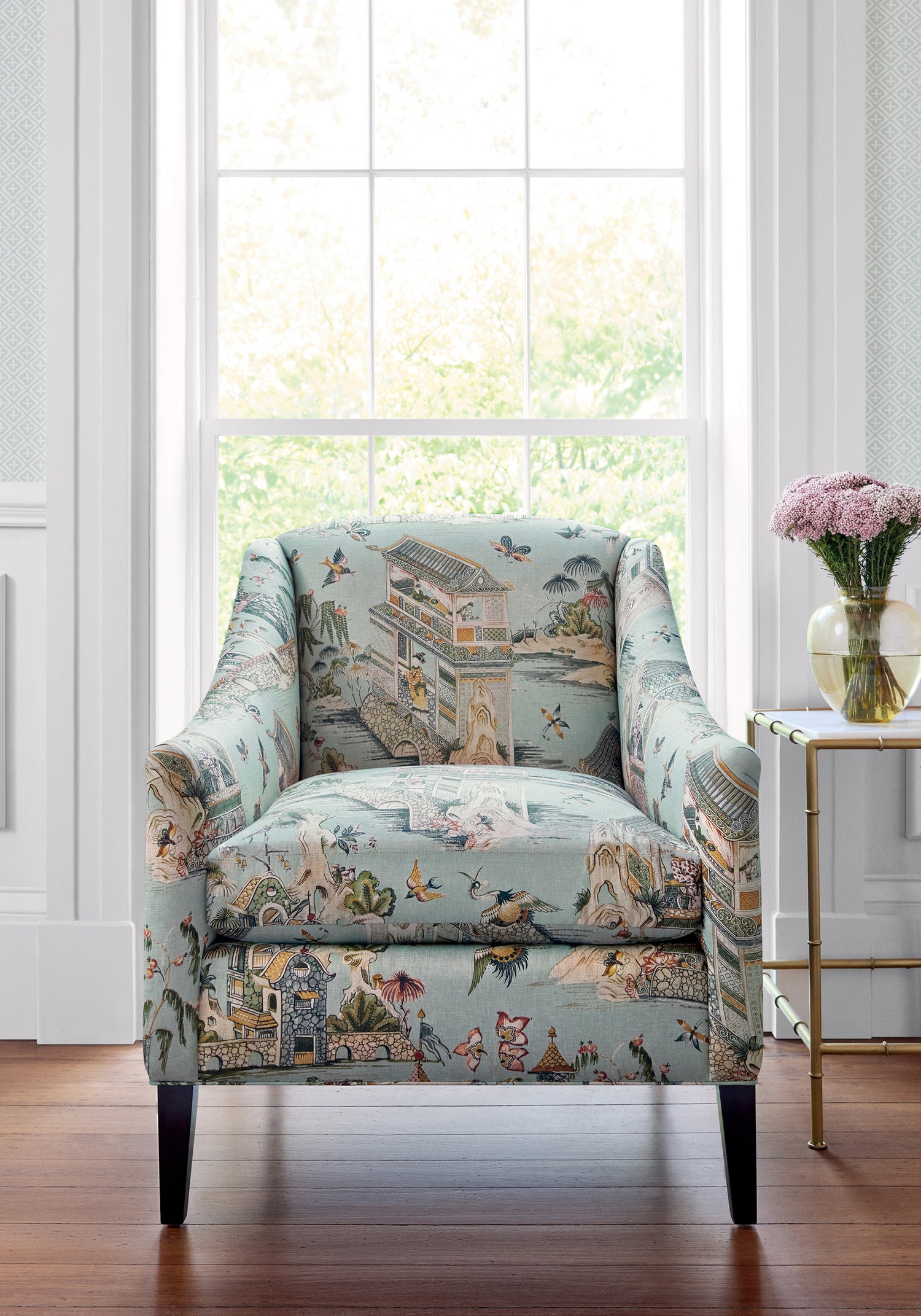 Frontal view of Stanwick Chair in Grand Palace printed fabric in mist color - pattern number F913617 - by Thibaut in the Grand Palace collection