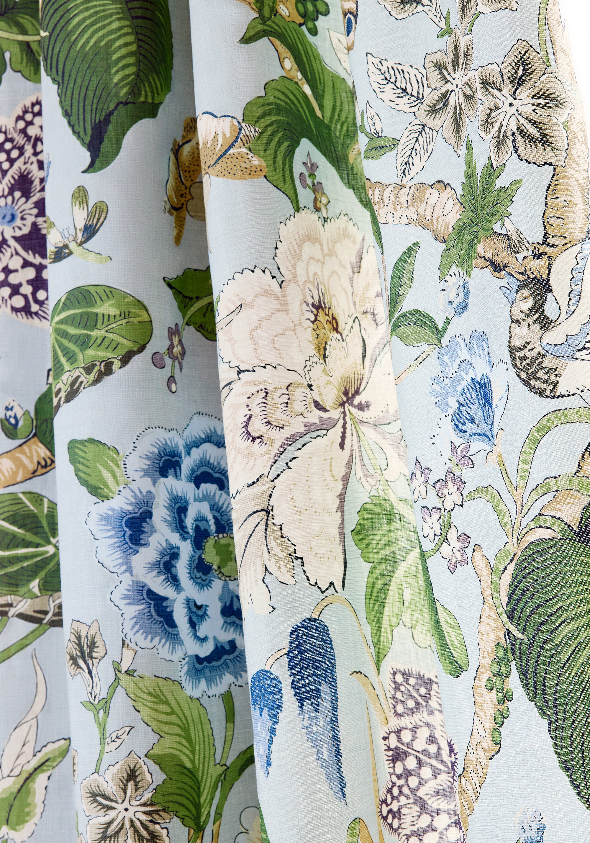 Detail of Hill Garden printed fabric in spa blue color of the Grand Palace collection by Thibaut - pattern number F913654