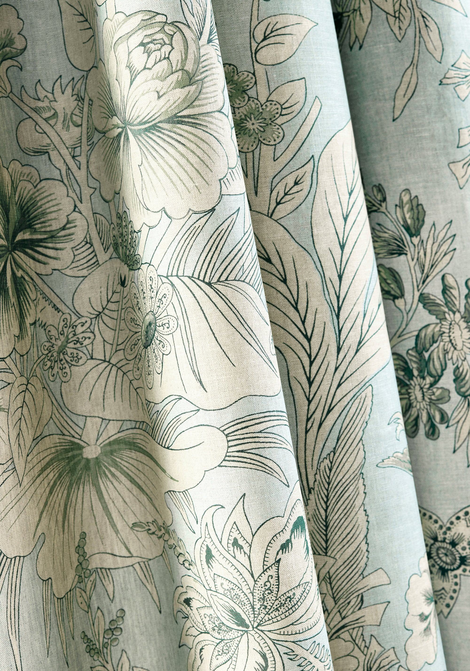Detail of curtains made with Rosalind printed fabric in Mist by Thibaut fabric pattern number F913603