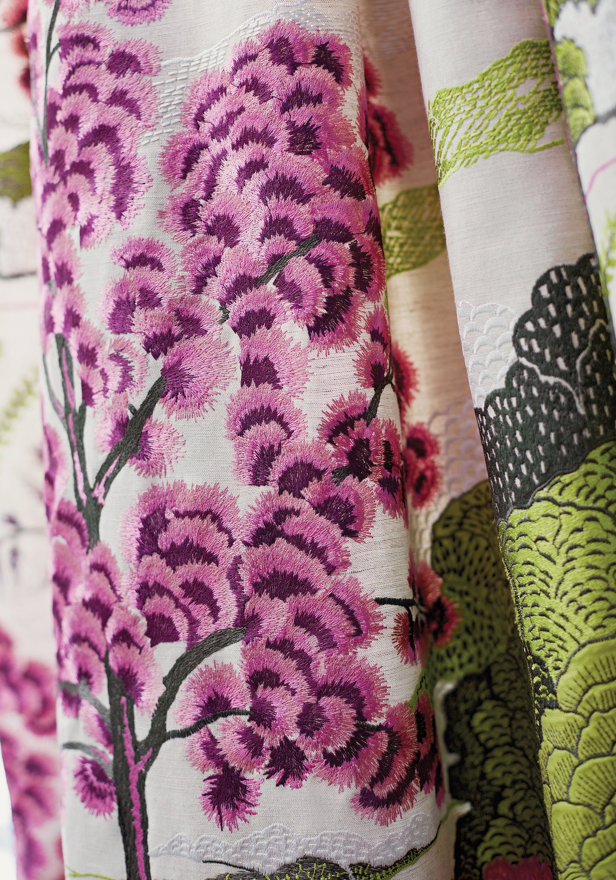 Close view of Daintree Embroidery fabric in fuchsia color - pattern number W785002 - by Thibaut in the Greenwood collection