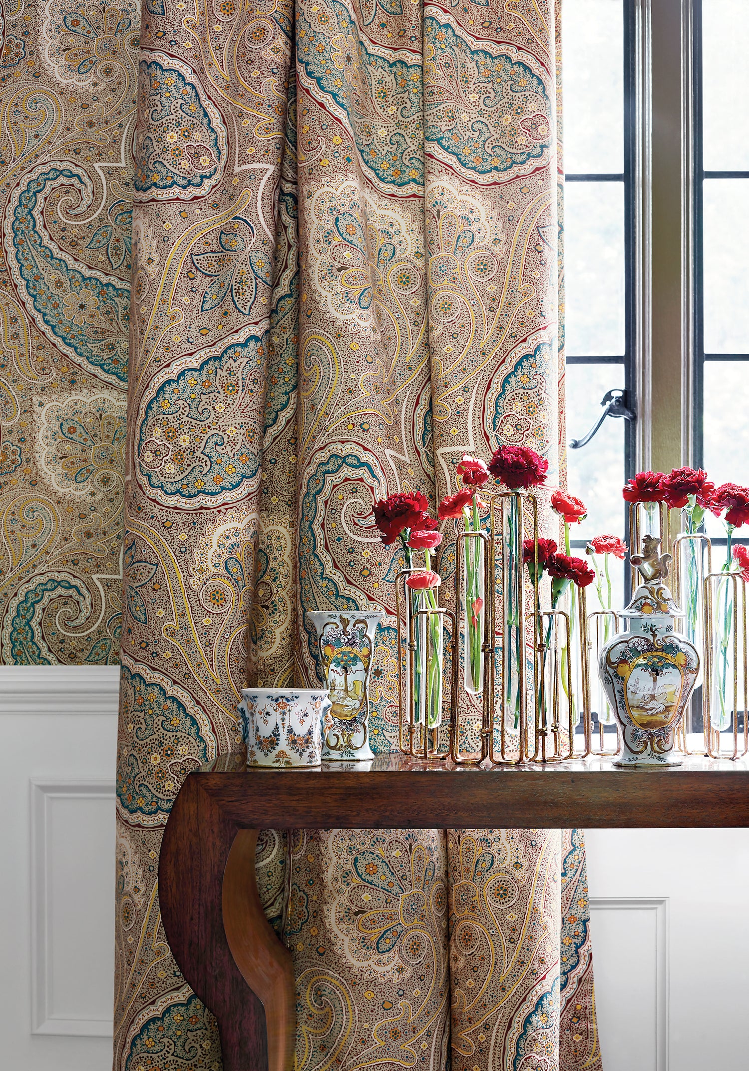Close view of curtains featuring Sherrill Paisley fabric in teal and beige color - pattern number F985076 - by Thibaut in the Greenwood collection