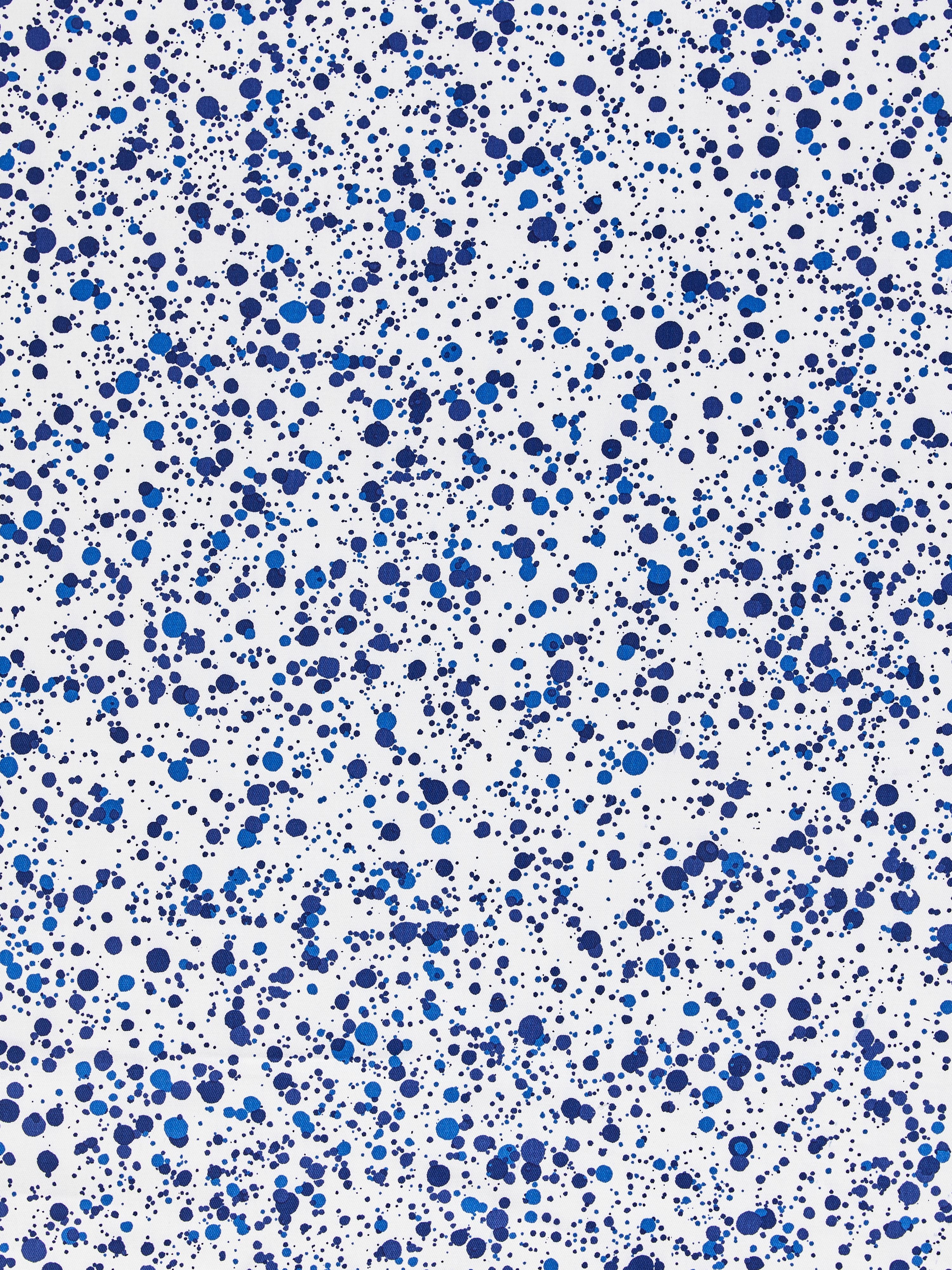 Spatter Cotton Print fabric in navy on white color - pattern number HN 000NF0153 - by Scalamandre in the Scalamandre Dec 2024 collection