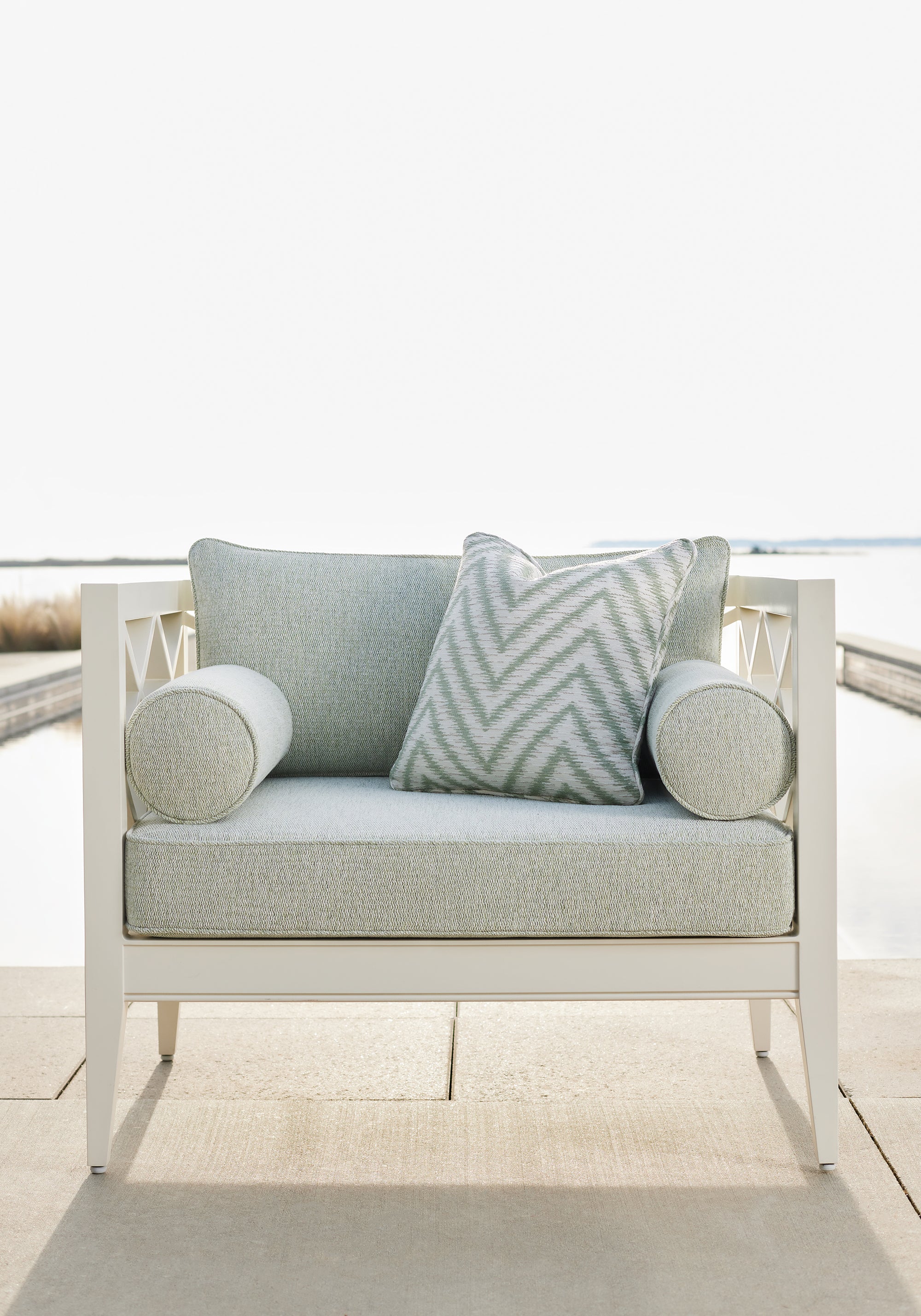 Outdoor chair featuring Arroyo fabric in aloe color - pattern number W8784 - by Thibaut in the Haven Textures collection