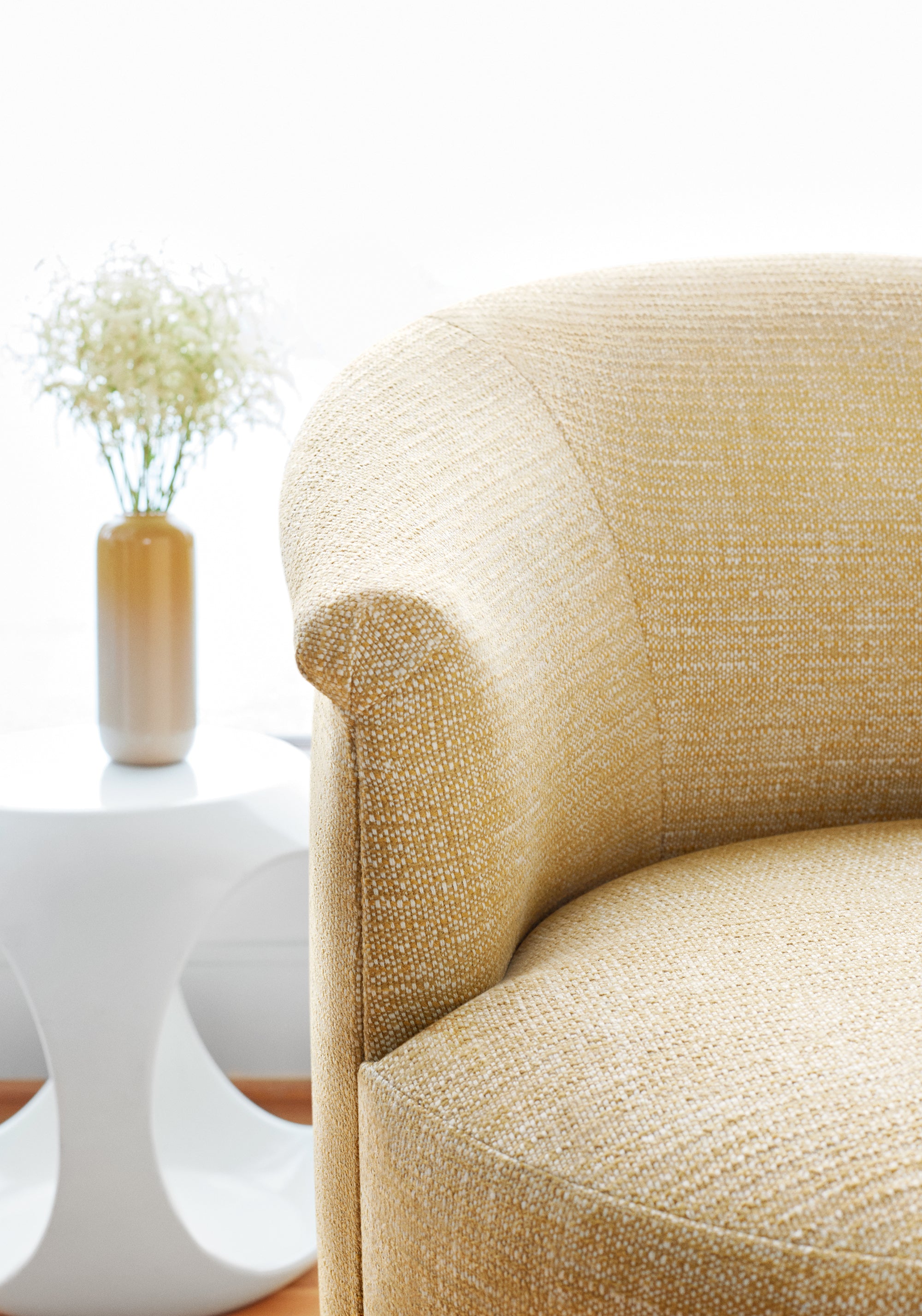 Close view of chair featuring Petra fabric in straw color - pattern number W8738 - by Thibaut in the Haven Textures collection