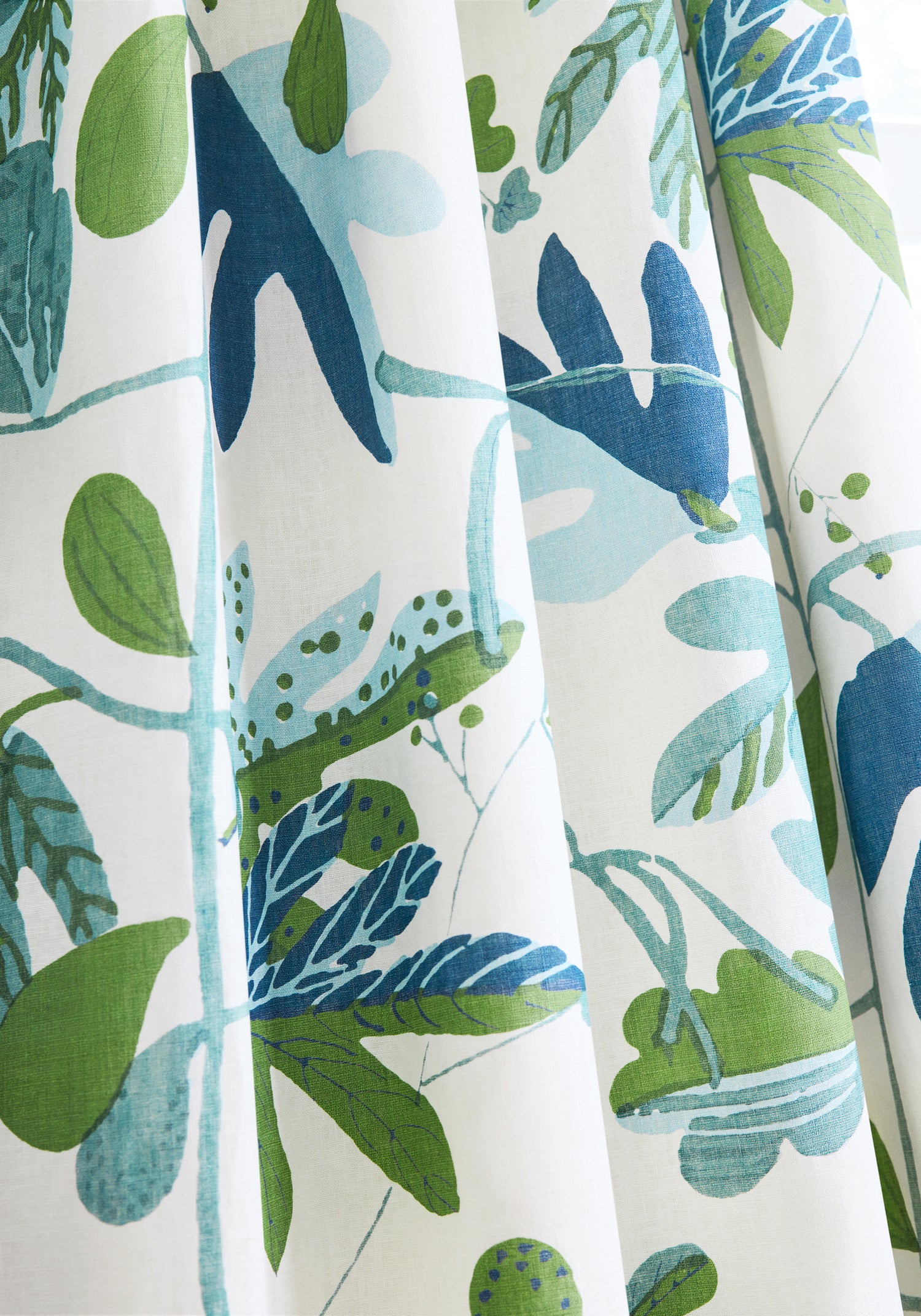 Draperies made with Thibaut Matisse Leaf printed fabric Green and Blue pattern number F916209