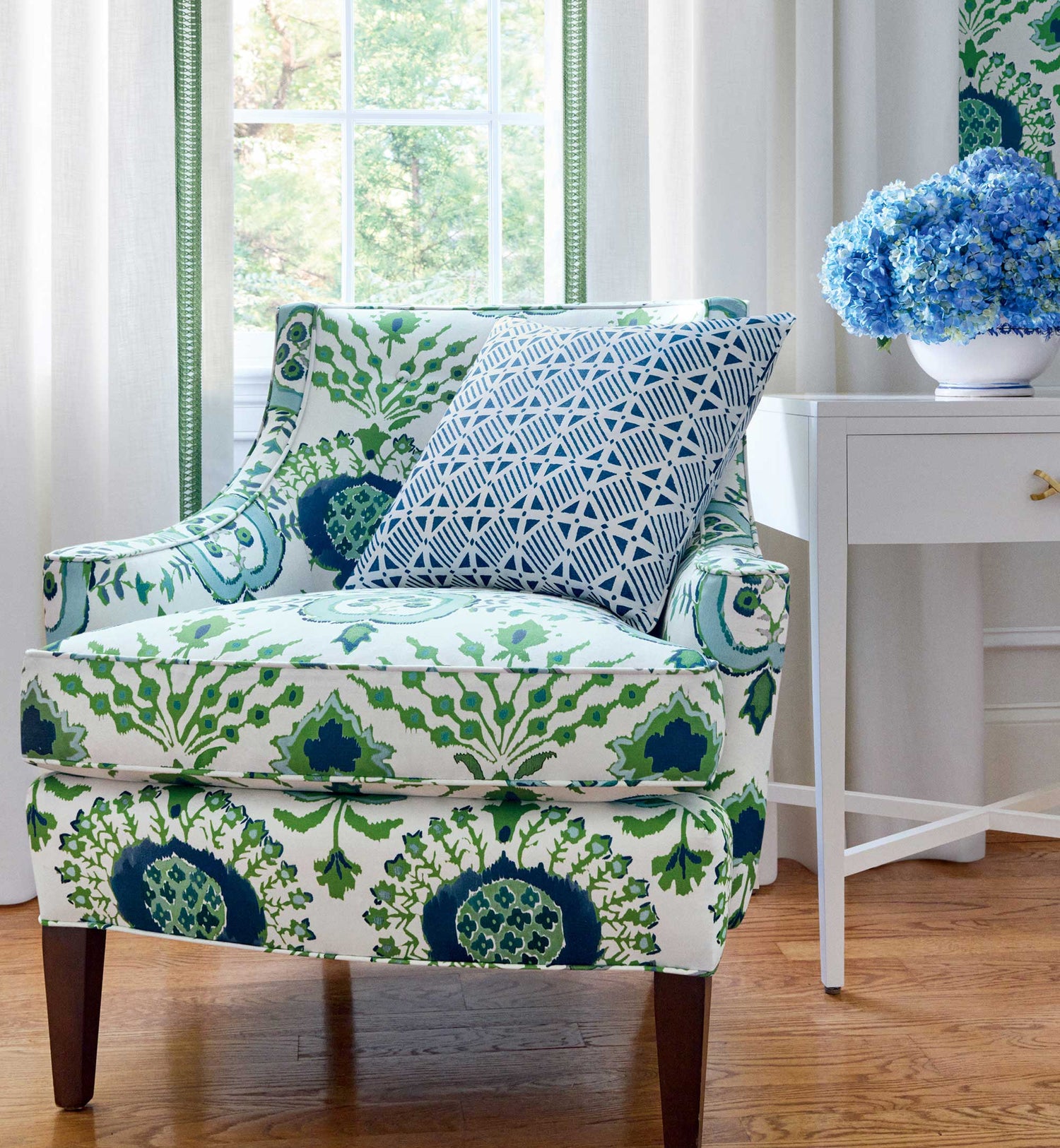 Thibaut fabric on an upholstered designer chair and pillow