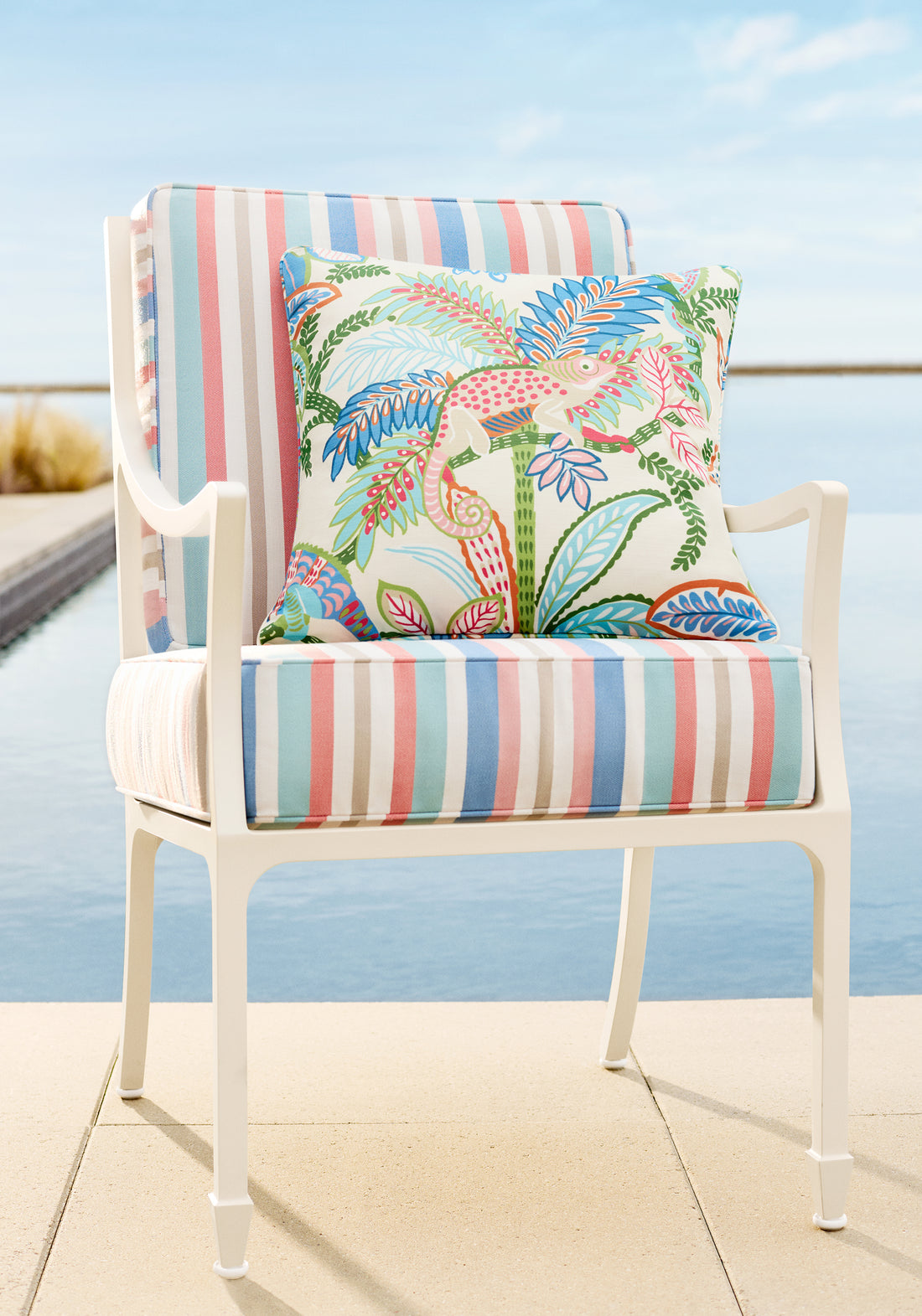 Pillow in Iggy fabric in island color - pattern number F81672 - by Thibaut in the Locale collection. Also pictured - Beaufort Dining Arm Chair from Mckinnon and Harris in Kalea Stripe woven fabric in Island color.