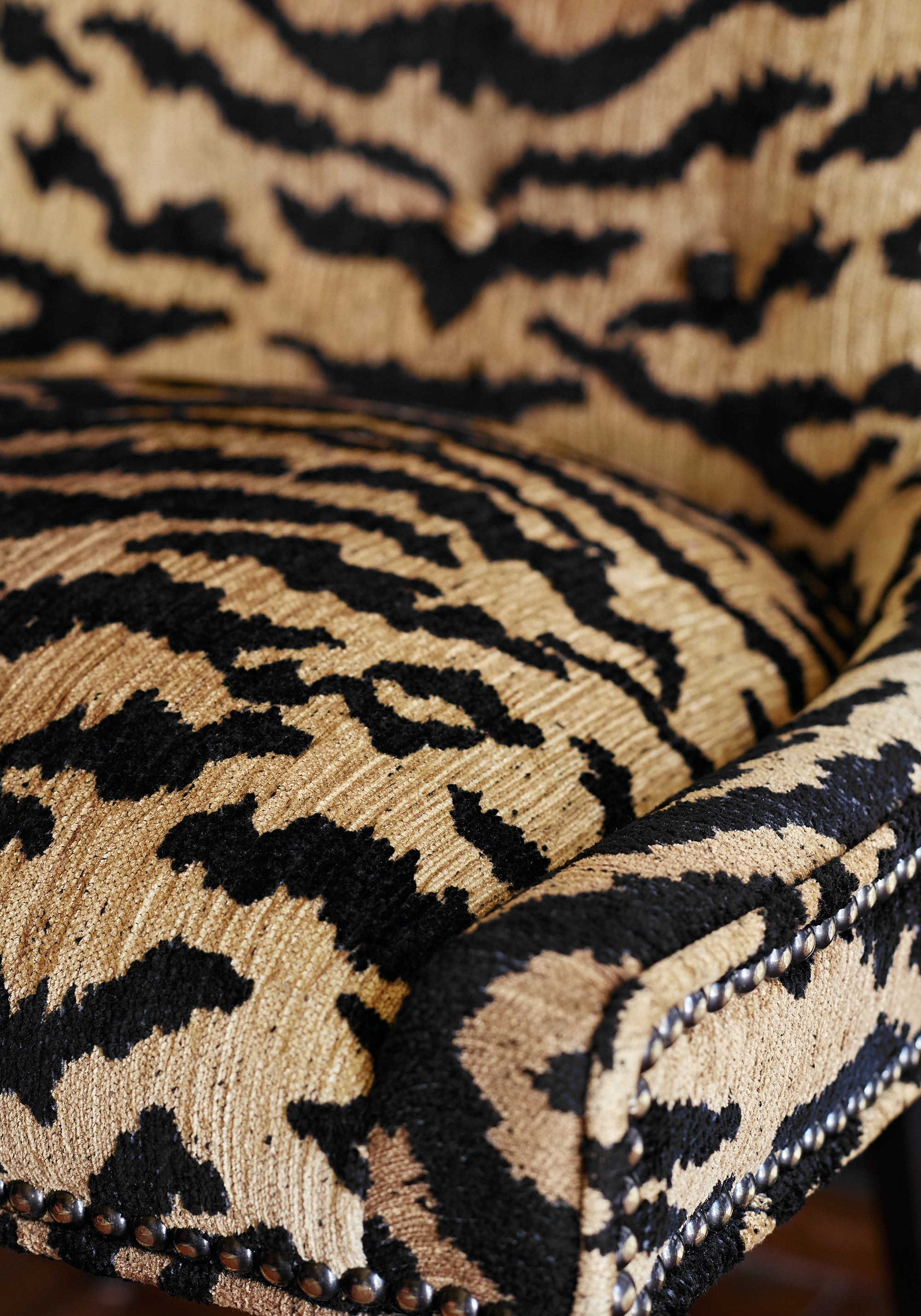 Detailed view of Melrose Chair in Aja woven fabric in black color - pattern number W80450 by Thibaut in the Woven Resource Vol 10 Menagerie collection