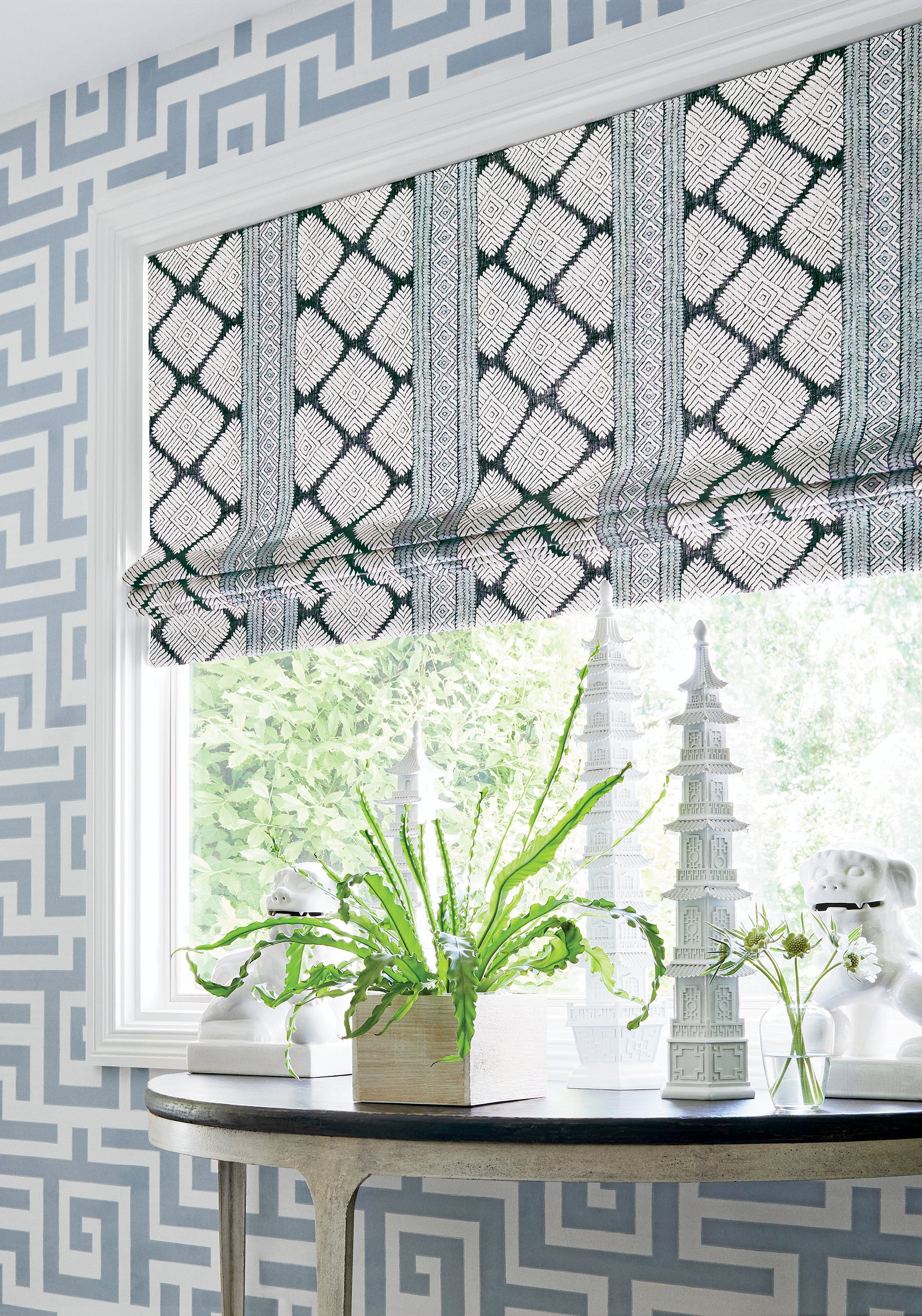 Roman shades in Austin printed fabric in black and mineral blue color - pattern number F913250 by Thibaut in the Mesa collection