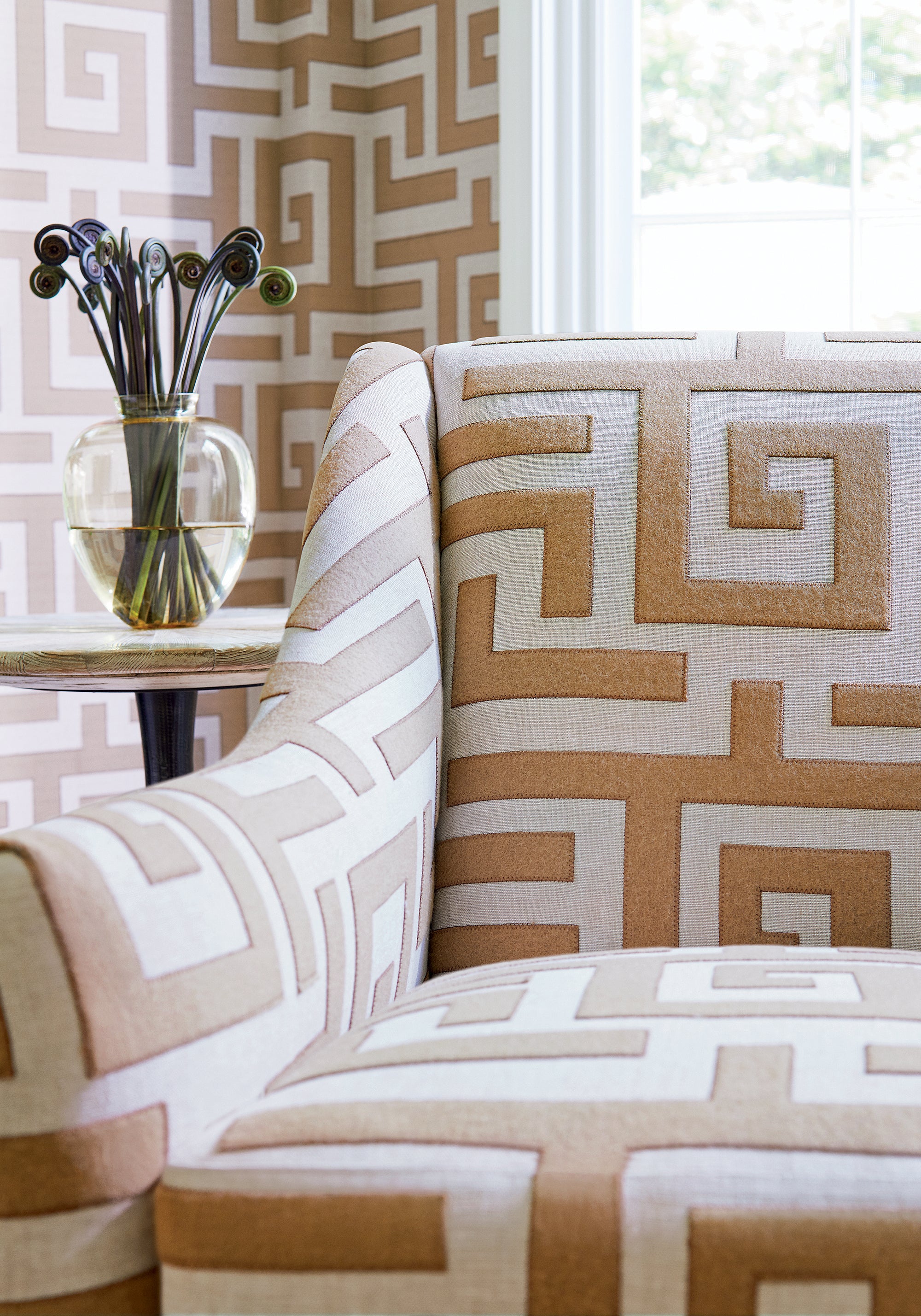 Detailed view of Saybrook Chair in Tulum Applique woven fabric in wheat on natural color variant by Thibaut in the Mesa collection - pattern number W713224