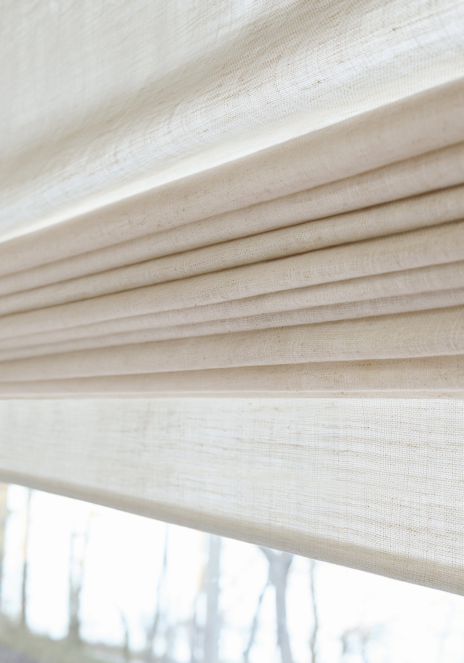 Detailed view of Terra Linen wide woven fabric window shades in linen color of the Palisades collection by Thibaut - pattern number FWW7676