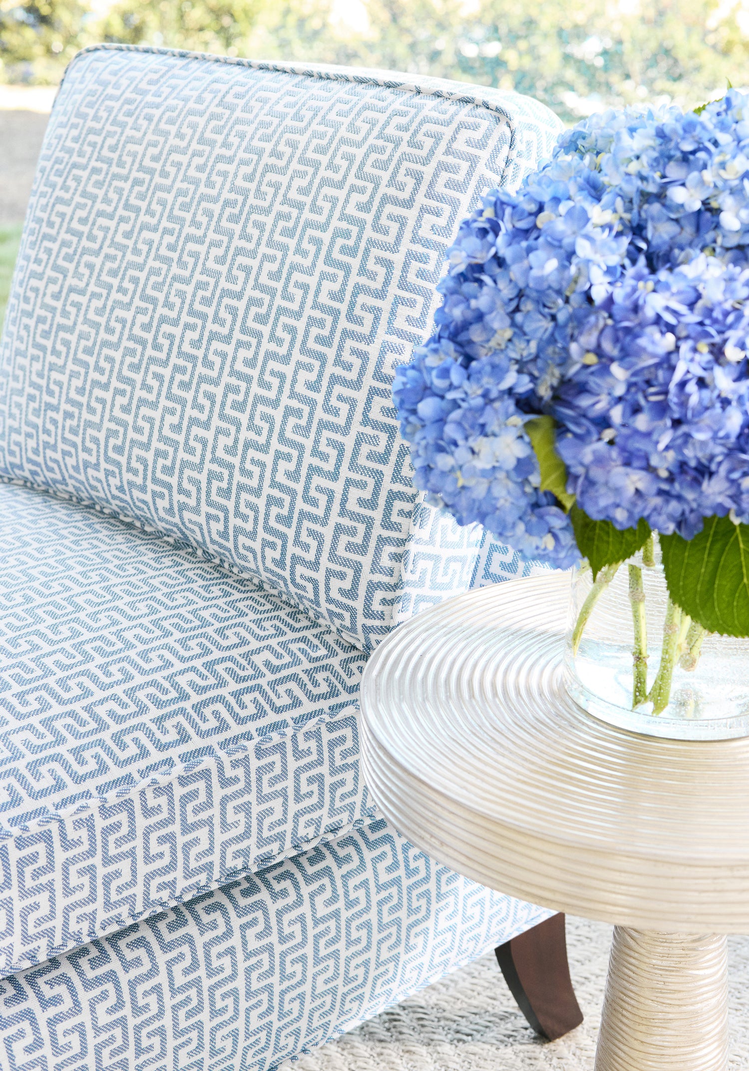 Closeup view of Mayfair Chair in Merritt fabric in cornflower color - pattern number W74248 - by Thibaut in the Passage collection