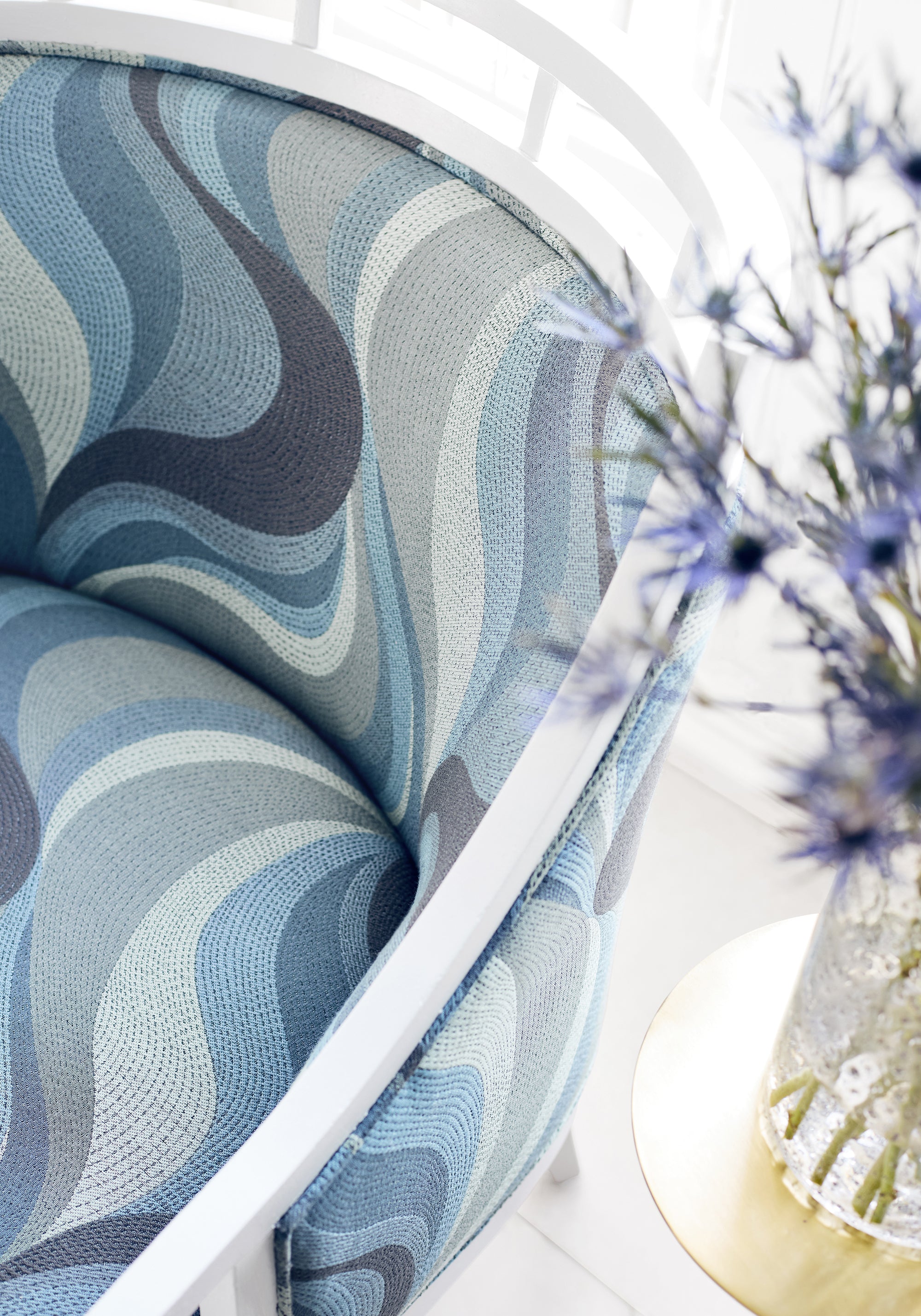 Closeup of Malibu Chair in Passage woven fabric in Lake color - pattern number W74201 - by Thibaut in the Passage collection