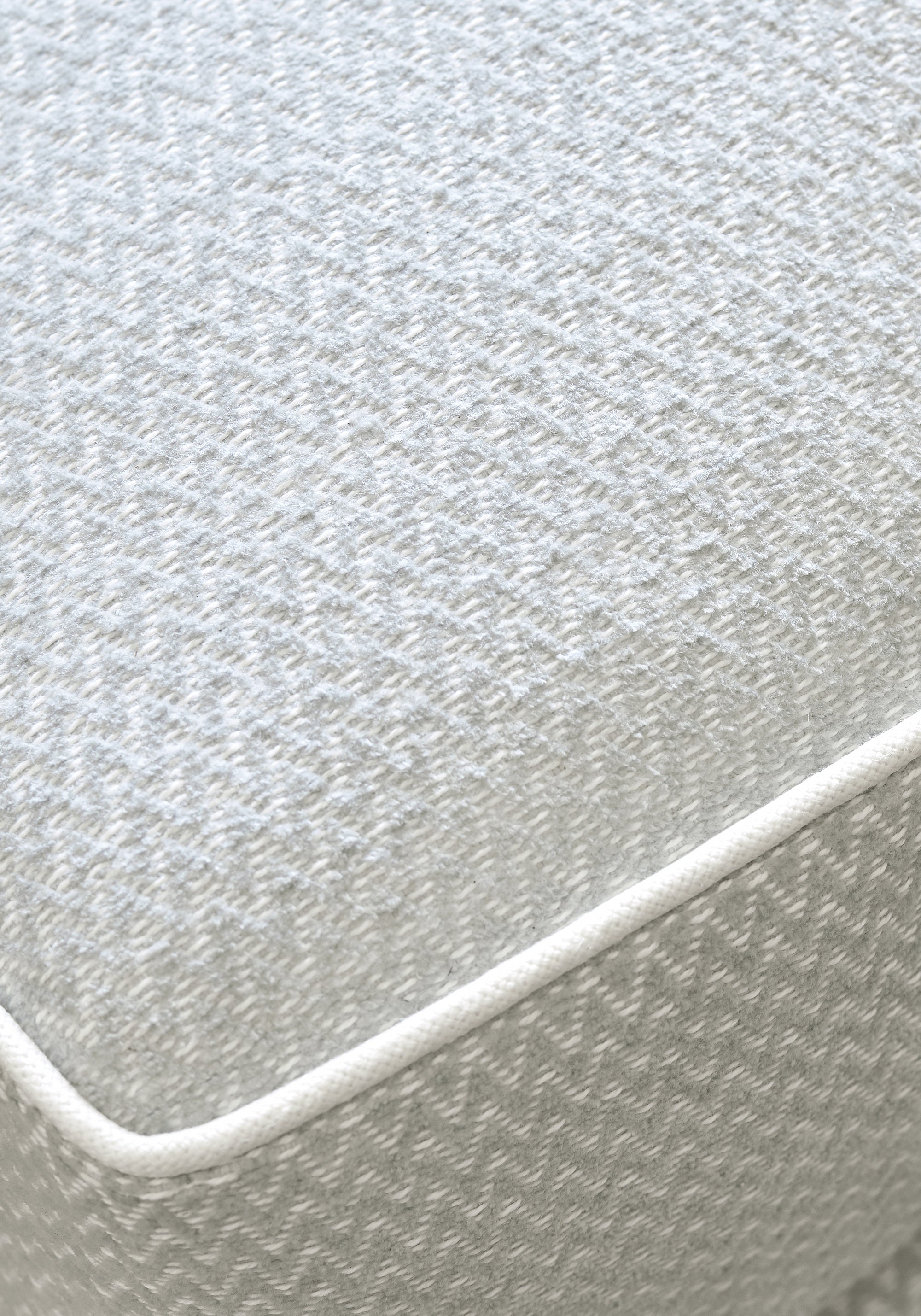 Detailed Alpine Chevron woven fabric in fog color, pattern number W80654 of the Thibaut Pinnacle collection