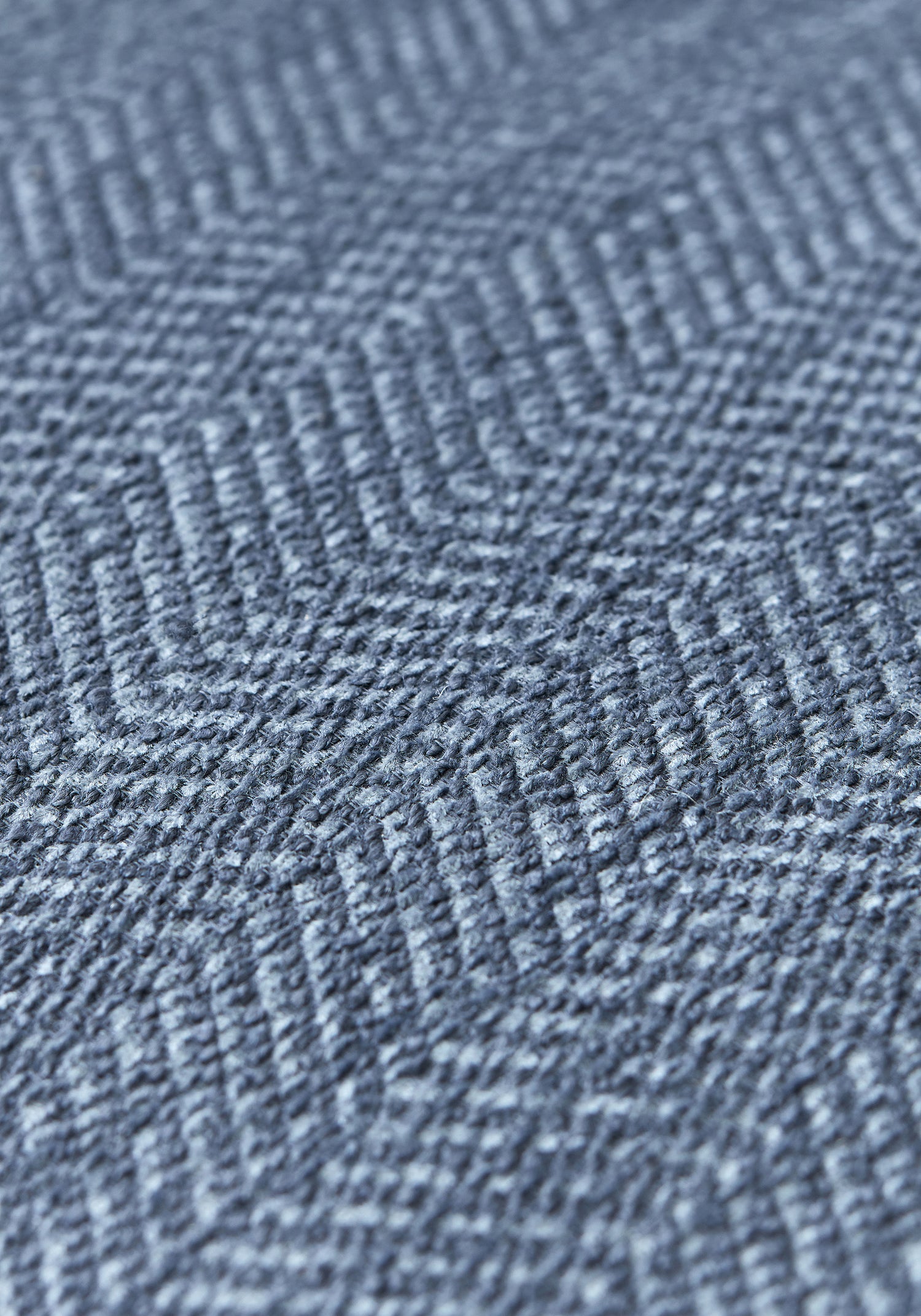 Detailed Dalton Herringbone woven fabric in cadet color, pattern number W80626 of the Thibaut Pinnacle collection