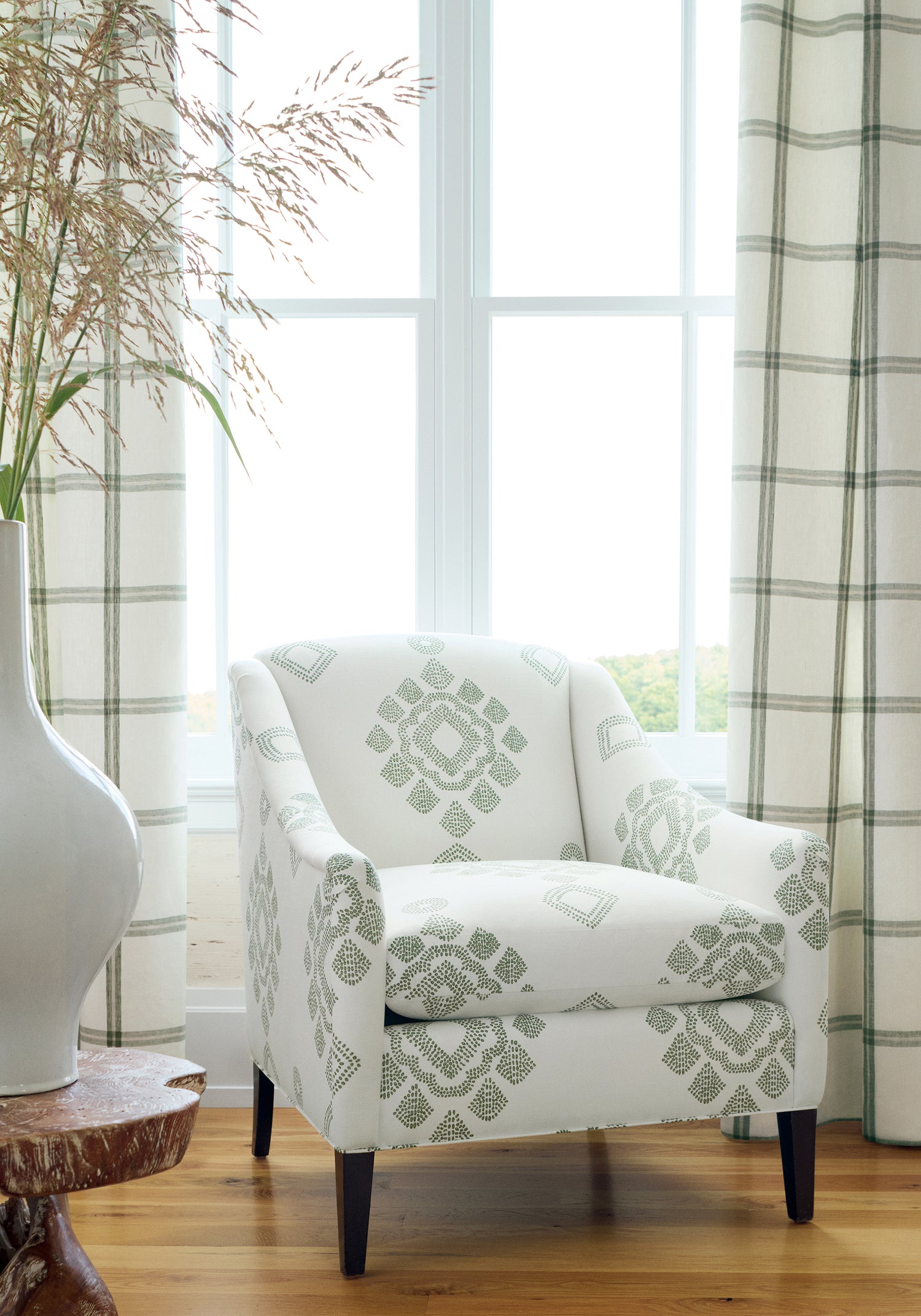 Living room with chair Province Medallion fabric in spruce color - pattern number F981322 - by Thibaut in the Montecito collection