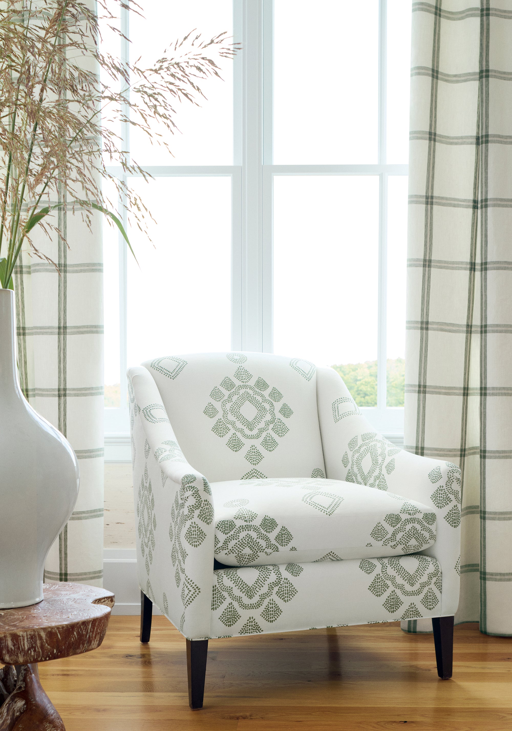 Living room with chair Province Medallion fabric in spruce color - pattern number F981322 - by Thibaut in the Montecito collection