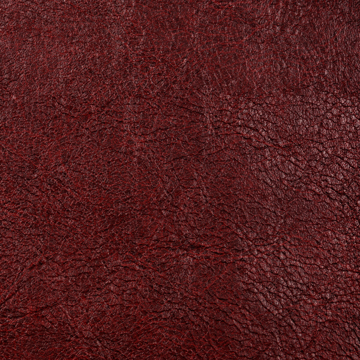 Reboot fabric in bordeaux color - pattern number REBOOT.9.0 - by Kravet Contract in the Evolve Faux Leather collection