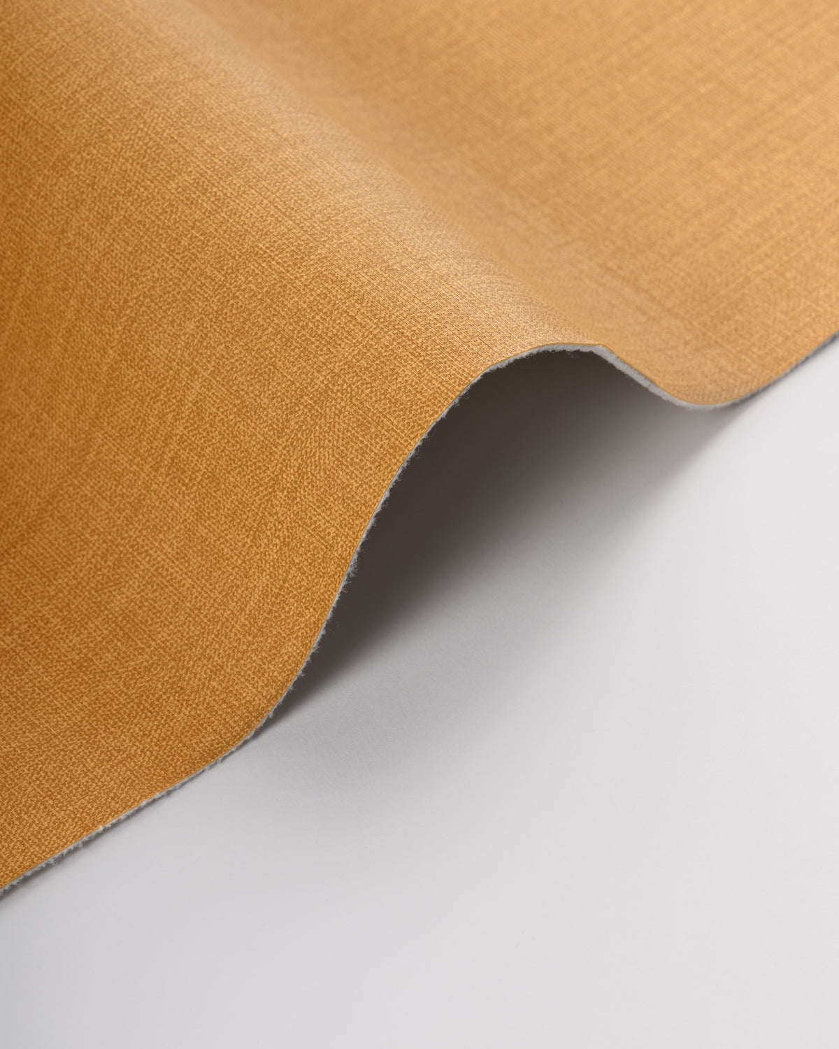 Remix fabric in Saffron color - pattern number REMIX.4.0 - by Kravet Contract in the Evolve Faux Leather collection