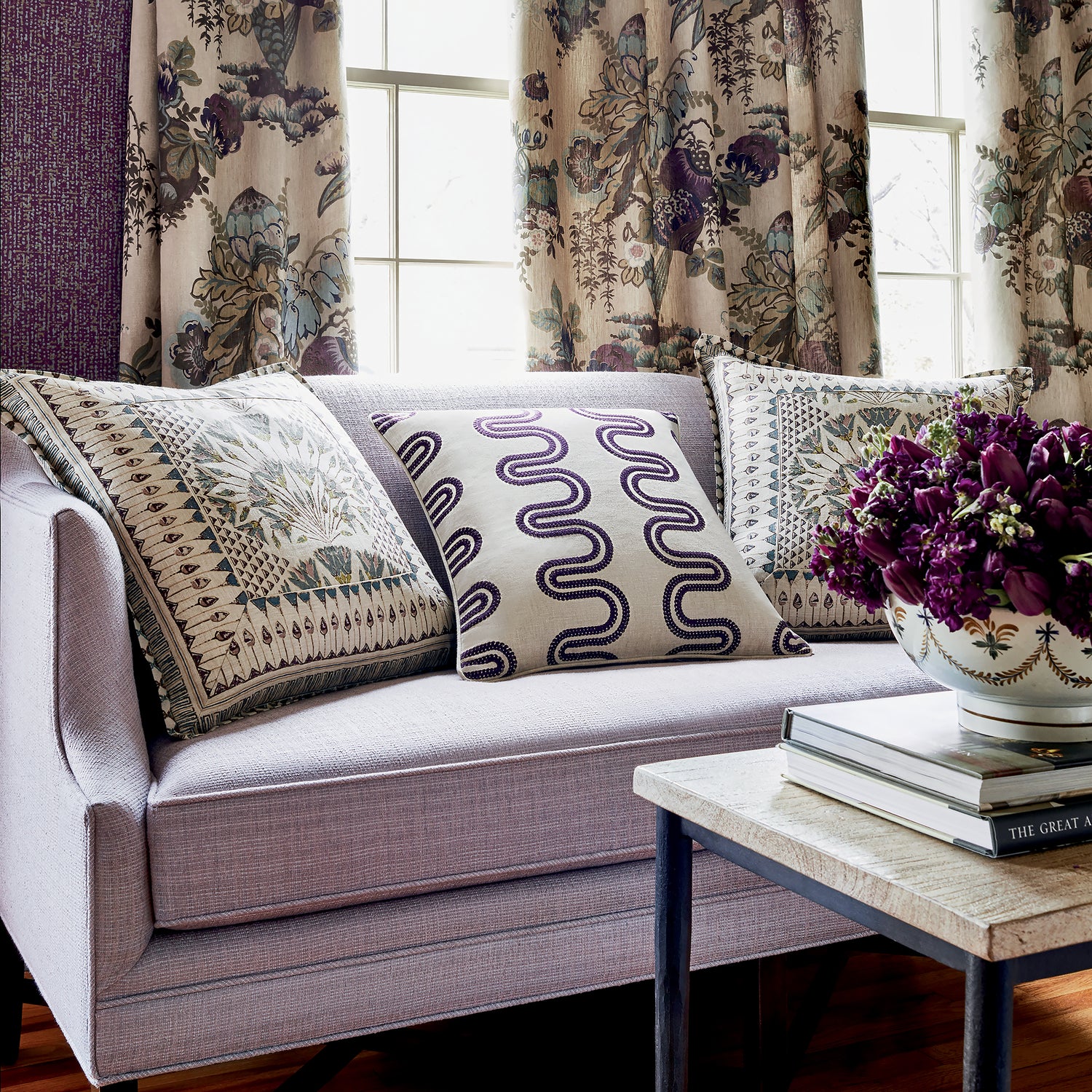 Room with draperies in Fairbanks printed fabric in Plum - pattern number AF9641 - by Anna French