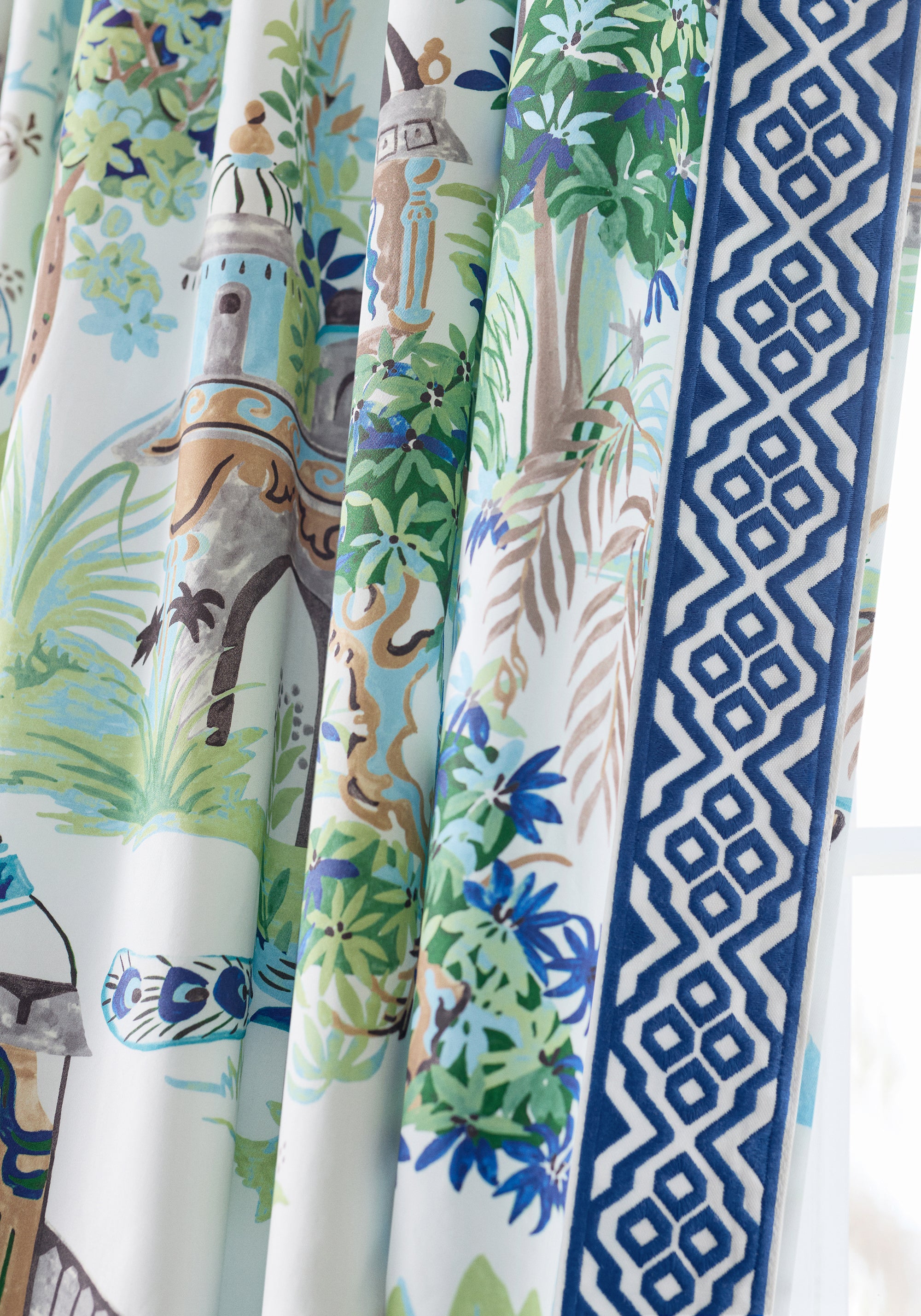 Detailed Mystic Garden printed fabric in blue and green color, pattern number F920820 of the Thibaut Eden collection
