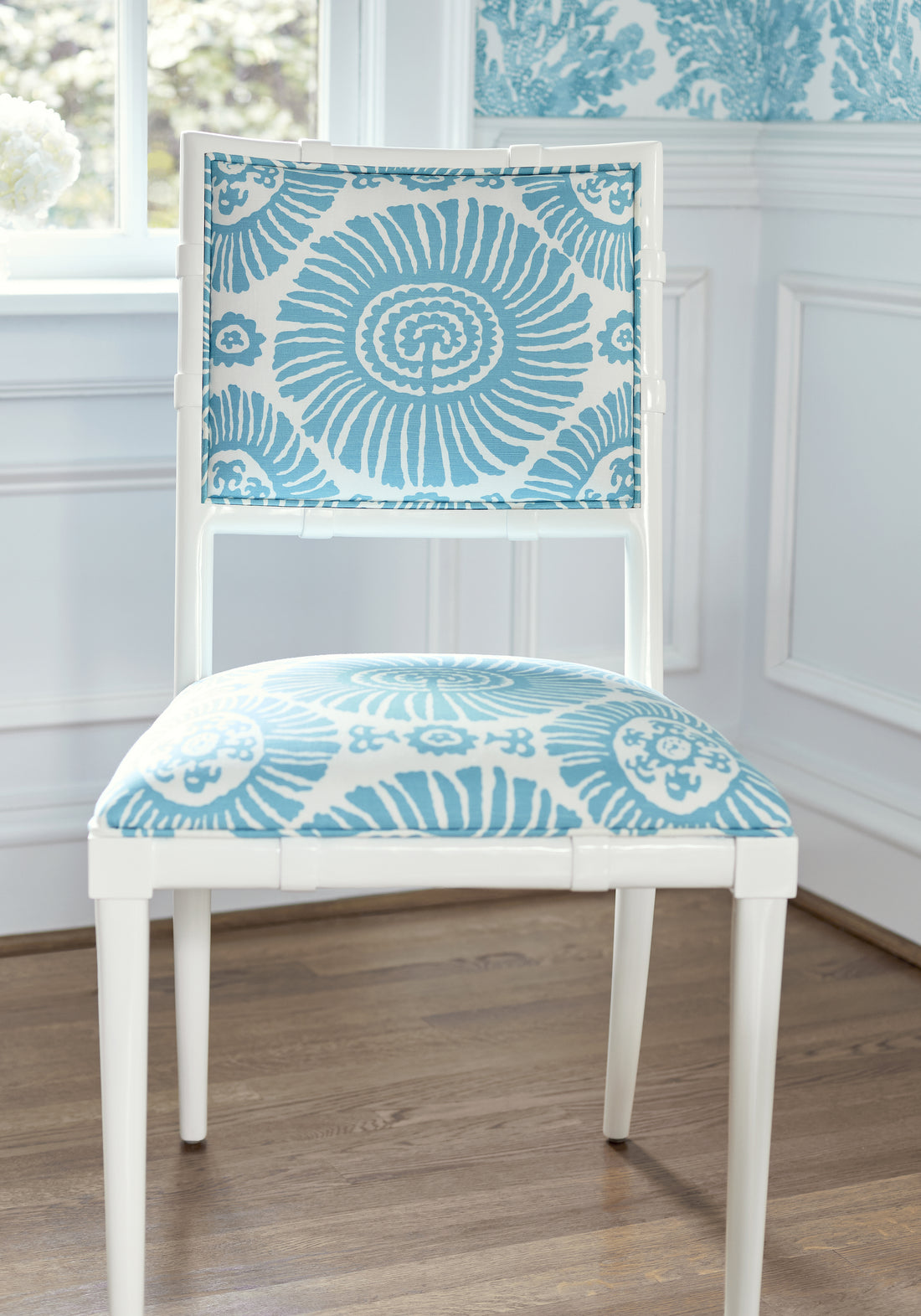 Frontal view of Greenwich Dining Chair in Solis printed fabric in turquoise color - pattern number F910085 - by Thibaut in the Tropics collection