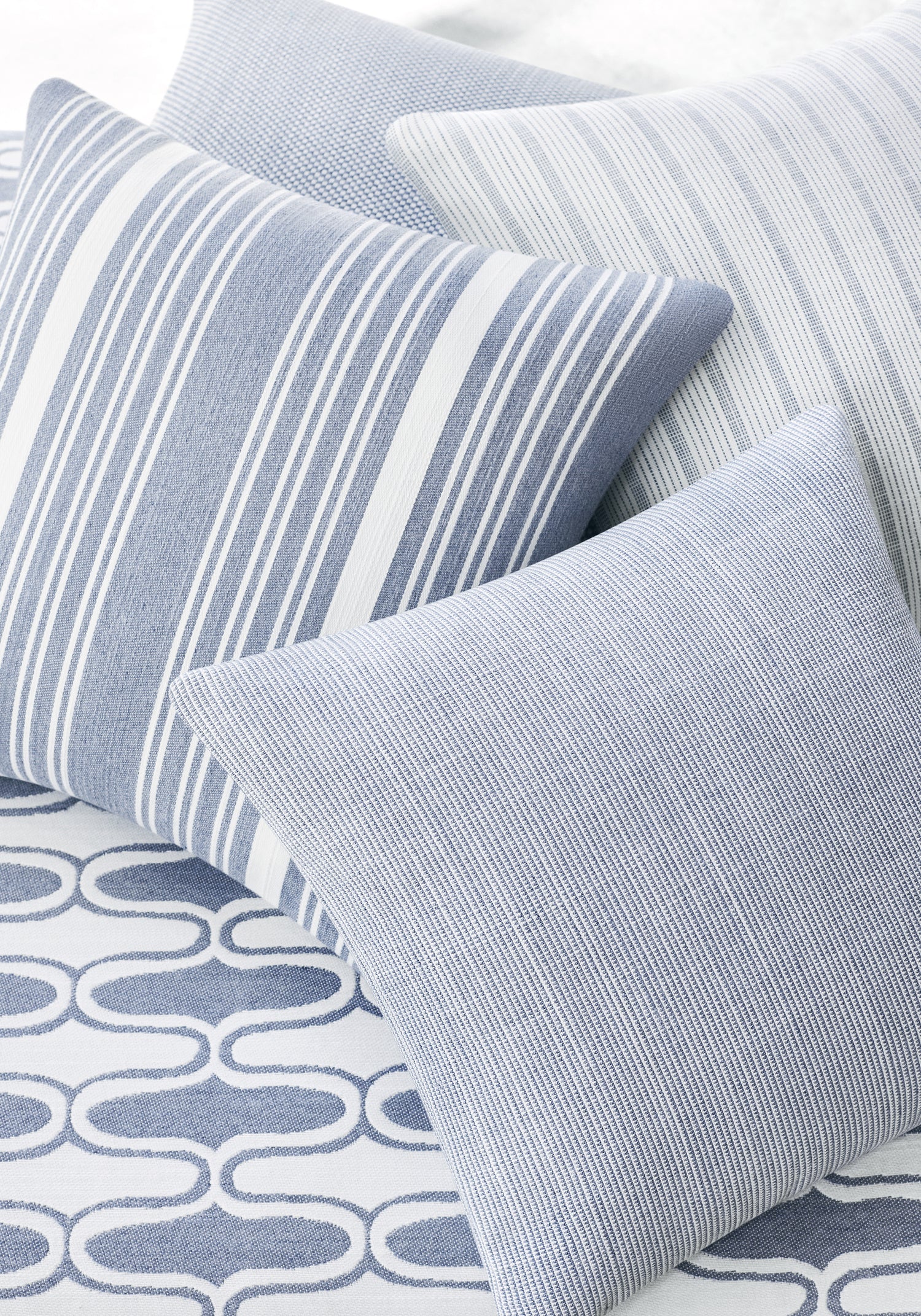 Detail of pillow in Mateo woven fabric in horizon color - pattern number W8549 - by Thibaut