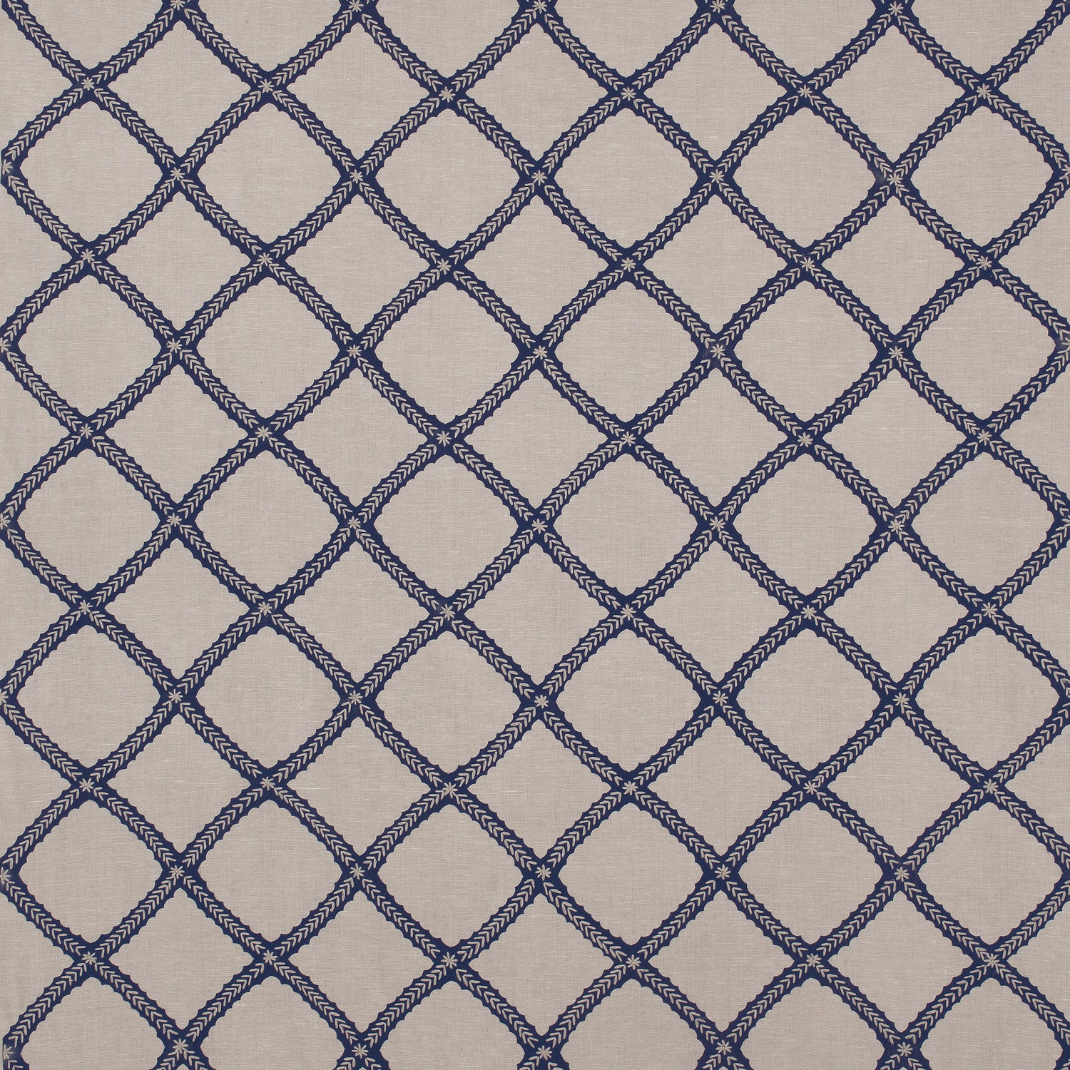 Majuli Embroidery fabric in navy on flax color - pattern number W788707 - by Thibaut in the Trade Routes collection