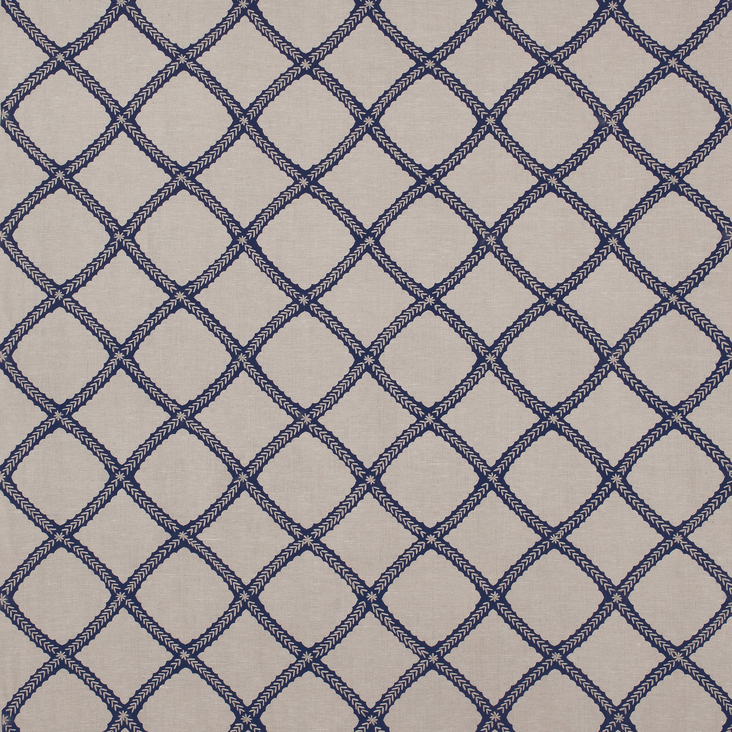 Majuli Embroidery fabric in navy on flax color - pattern number W788707 - by Thibaut in the Trade Routes collection