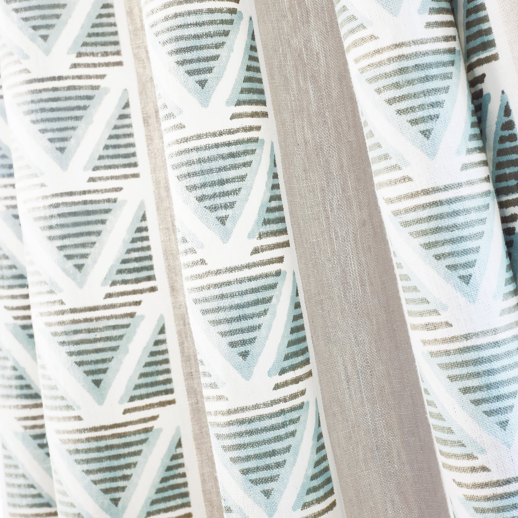 Detail of Draperies in Burton Stripe printed fabric in Linen and Turquoise