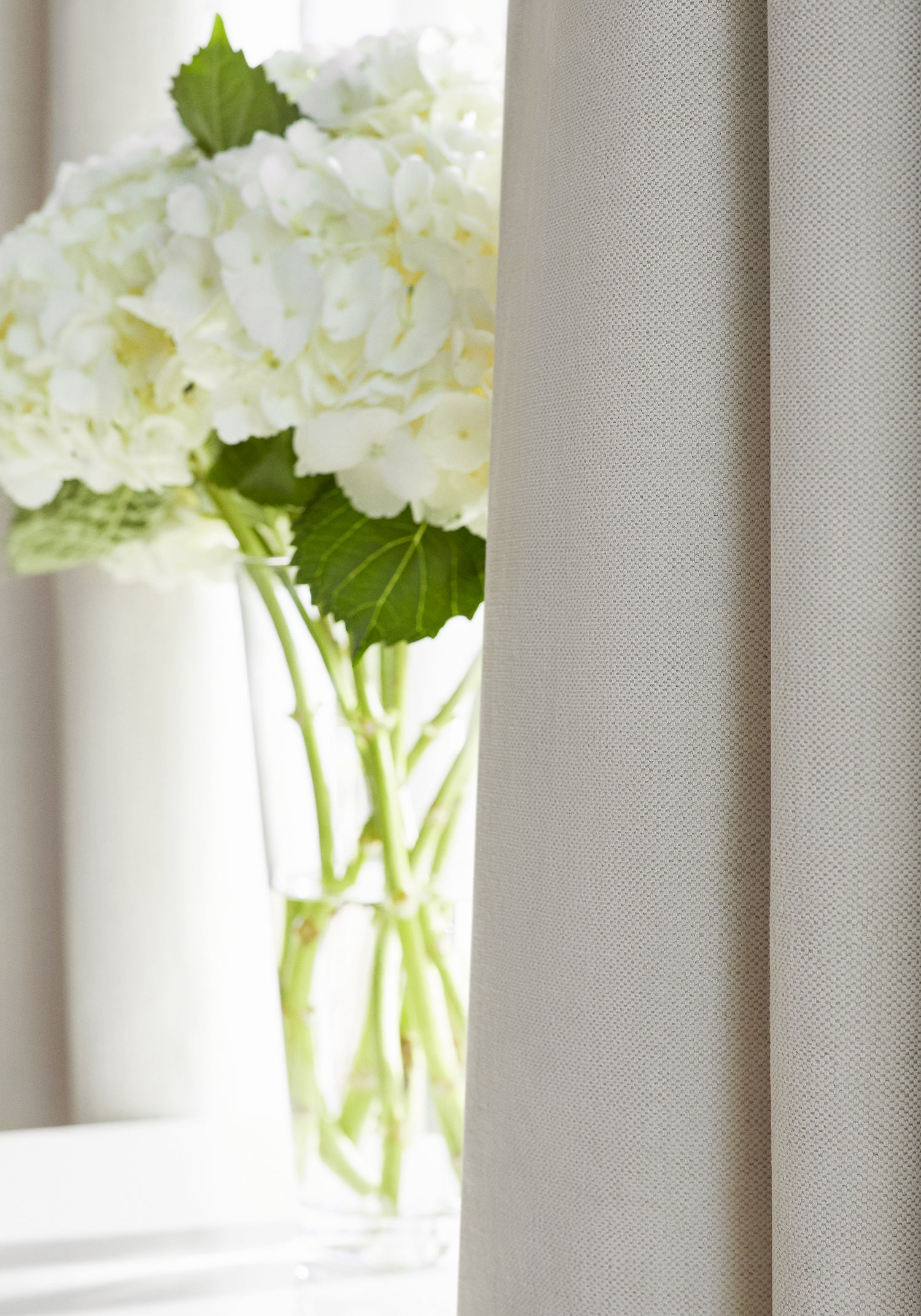 Detailed view of Prisma woven fabric drapes in almond color - pattern number W70104 by Thibaut in the Woven Resource Vol 12 Prisma collection