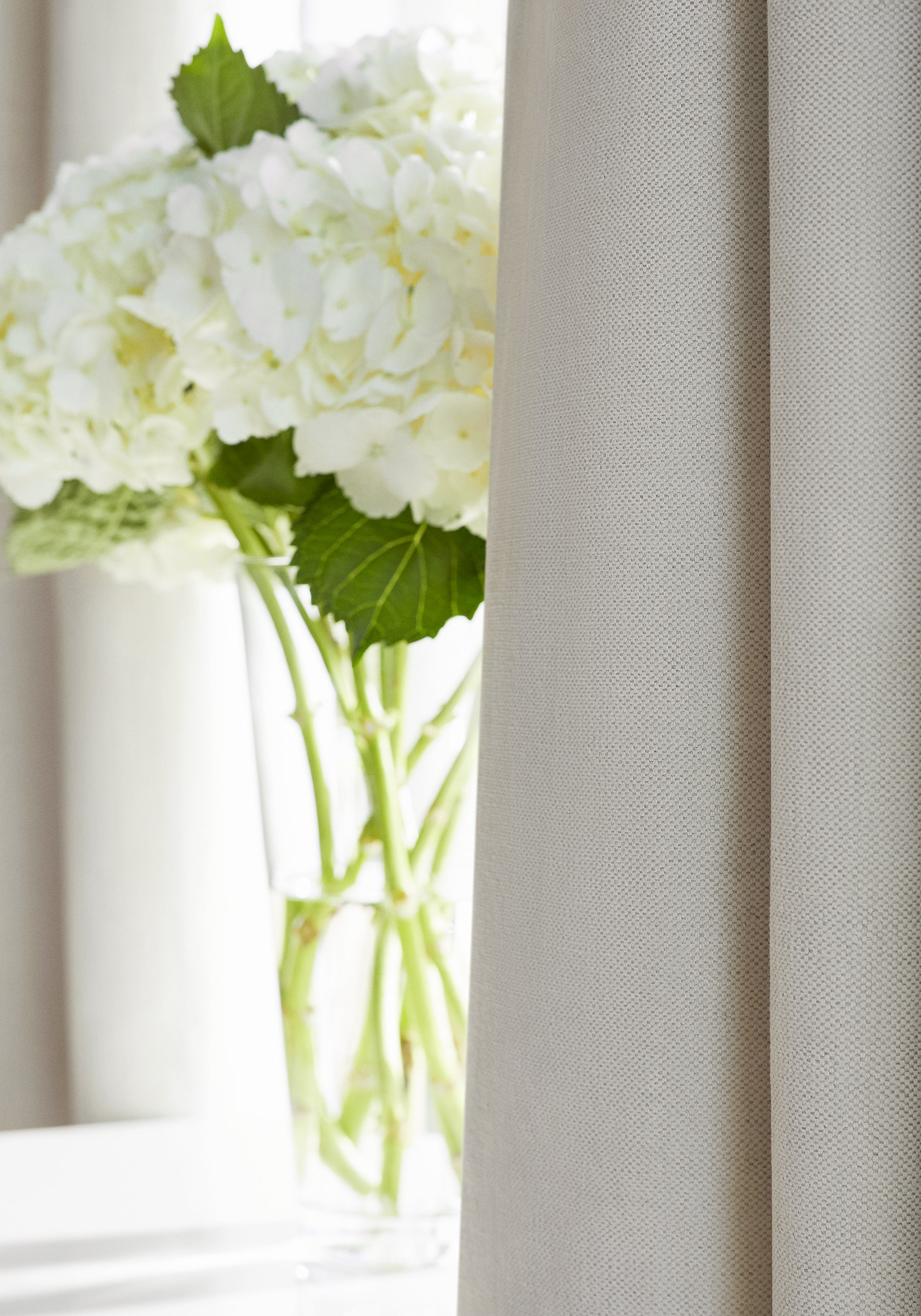 Detailed view of Prisma woven fabric drapes in almond color - pattern number W70104 by Thibaut in the Woven Resource Vol 12 Prisma collection