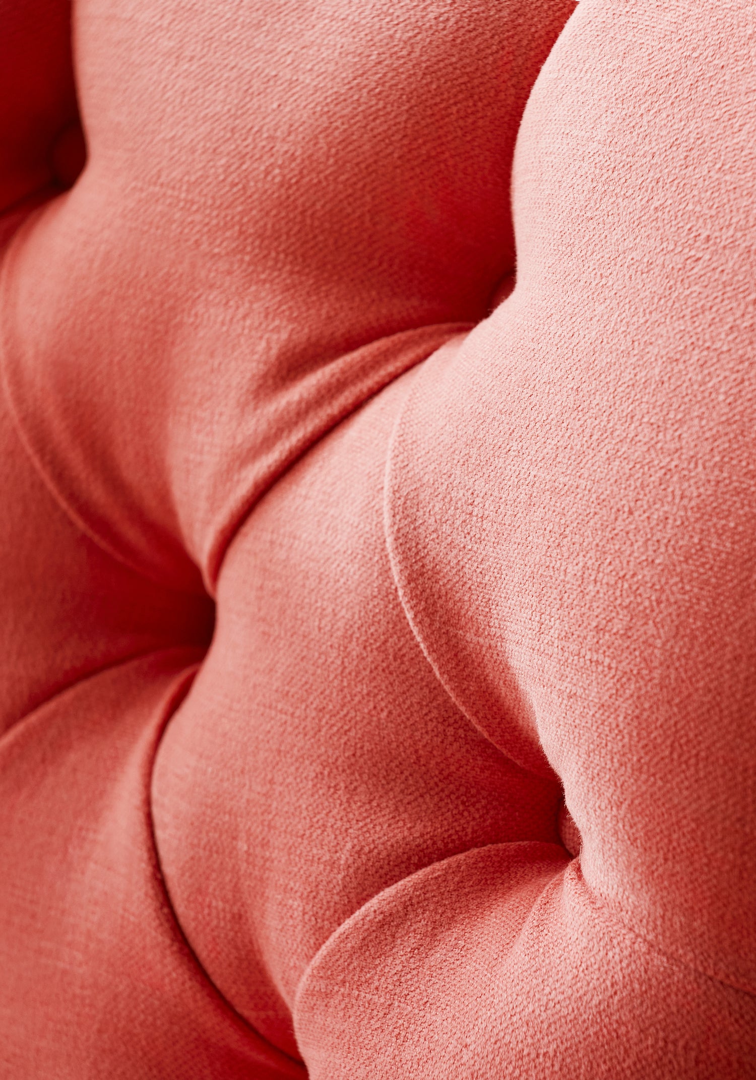 Detail of Middleton Chair in Prisma woven fabric in coral color of the Woven Resource Vol 12 Prisma collection by Thibaut - pattern number W70126